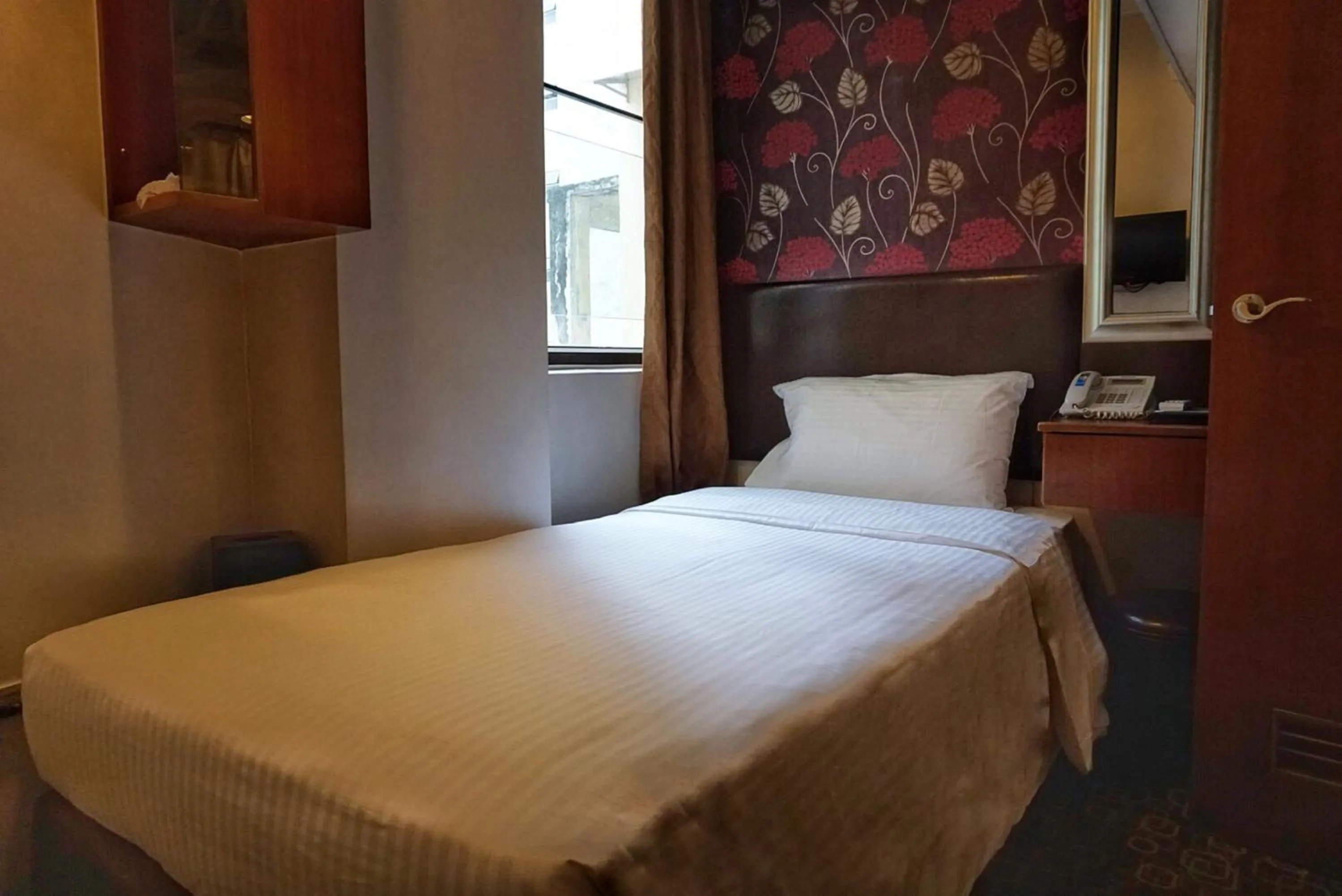 Bed in Lander Hotel Prince Edward