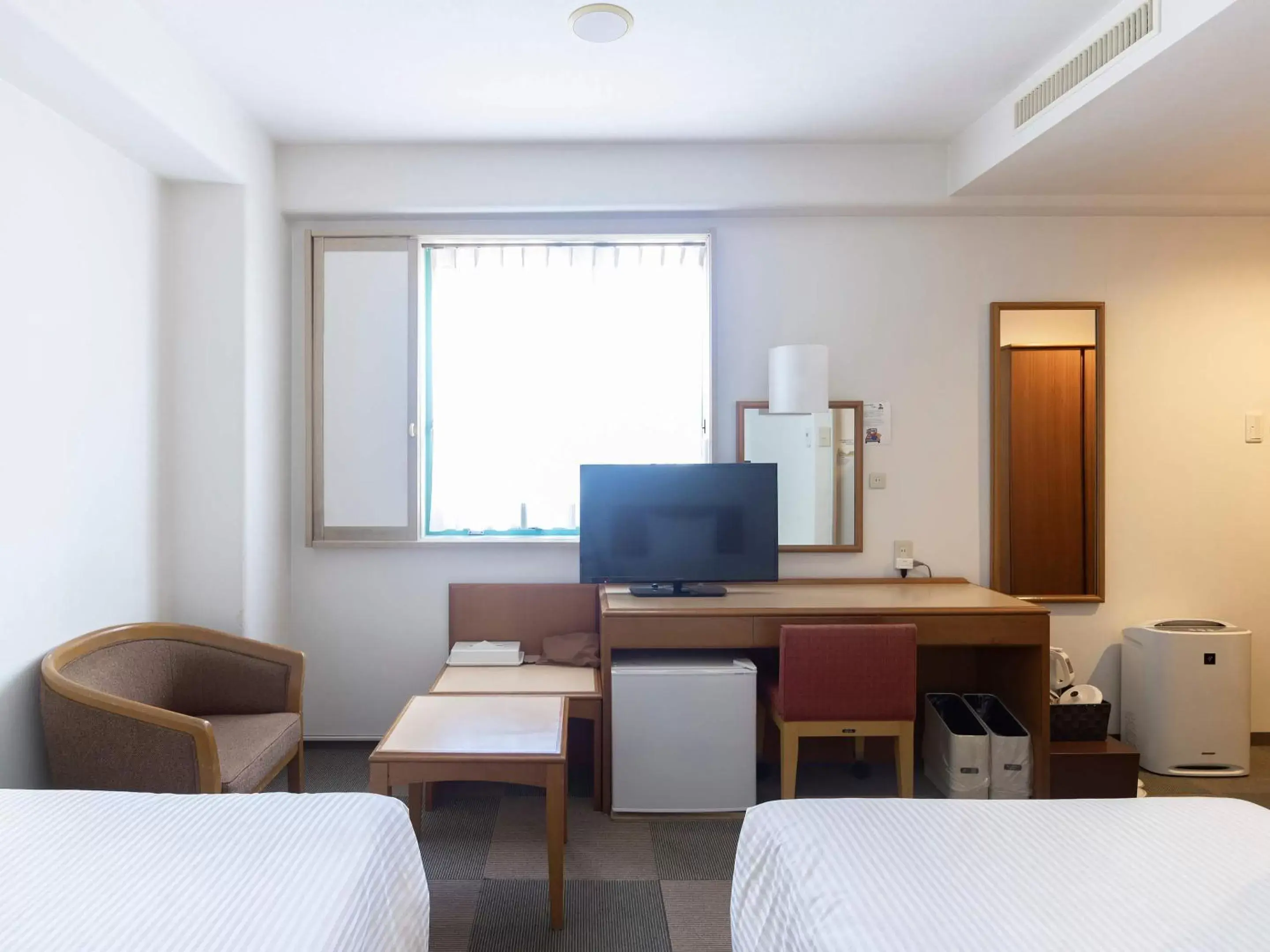 Bedroom, TV/Entertainment Center in Hotel Wing Port Nagasaki