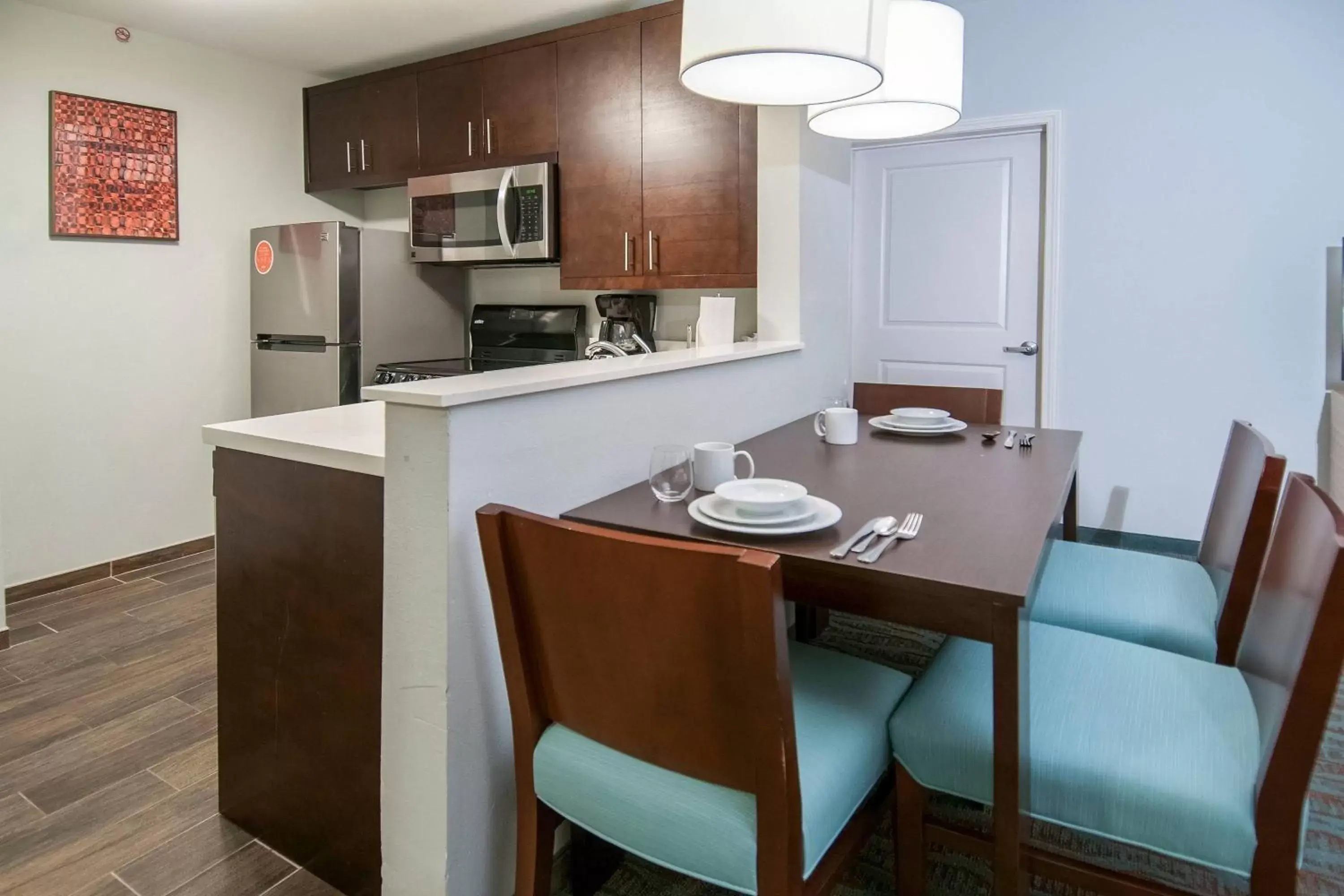 Bedroom, Kitchen/Kitchenette in TownePlace Suites by Marriott Vidalia Riverfront