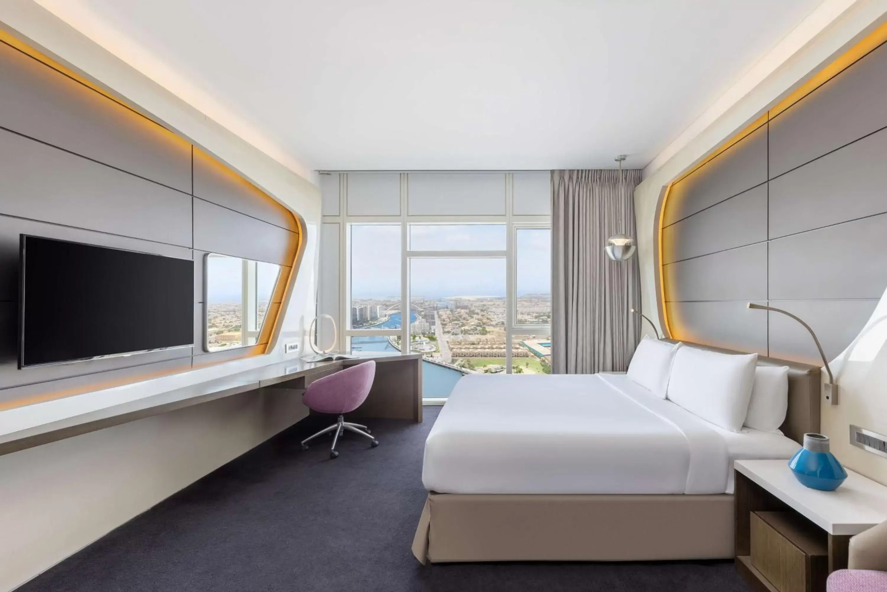 Bed, TV/Entertainment Center in V Hotel Dubai, Curio Collection by Hilton