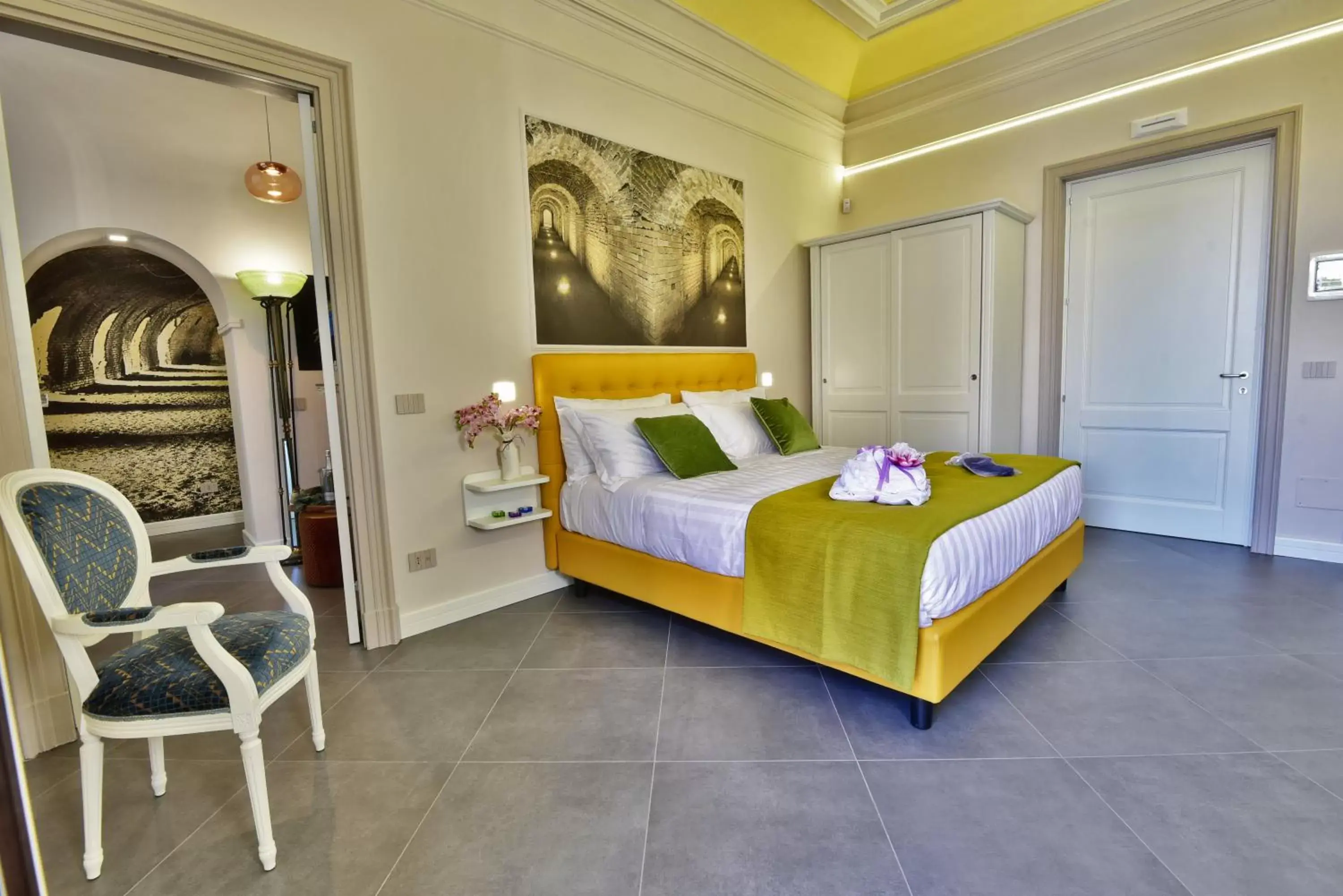 Bed in ANFITEATRO LE SUITES