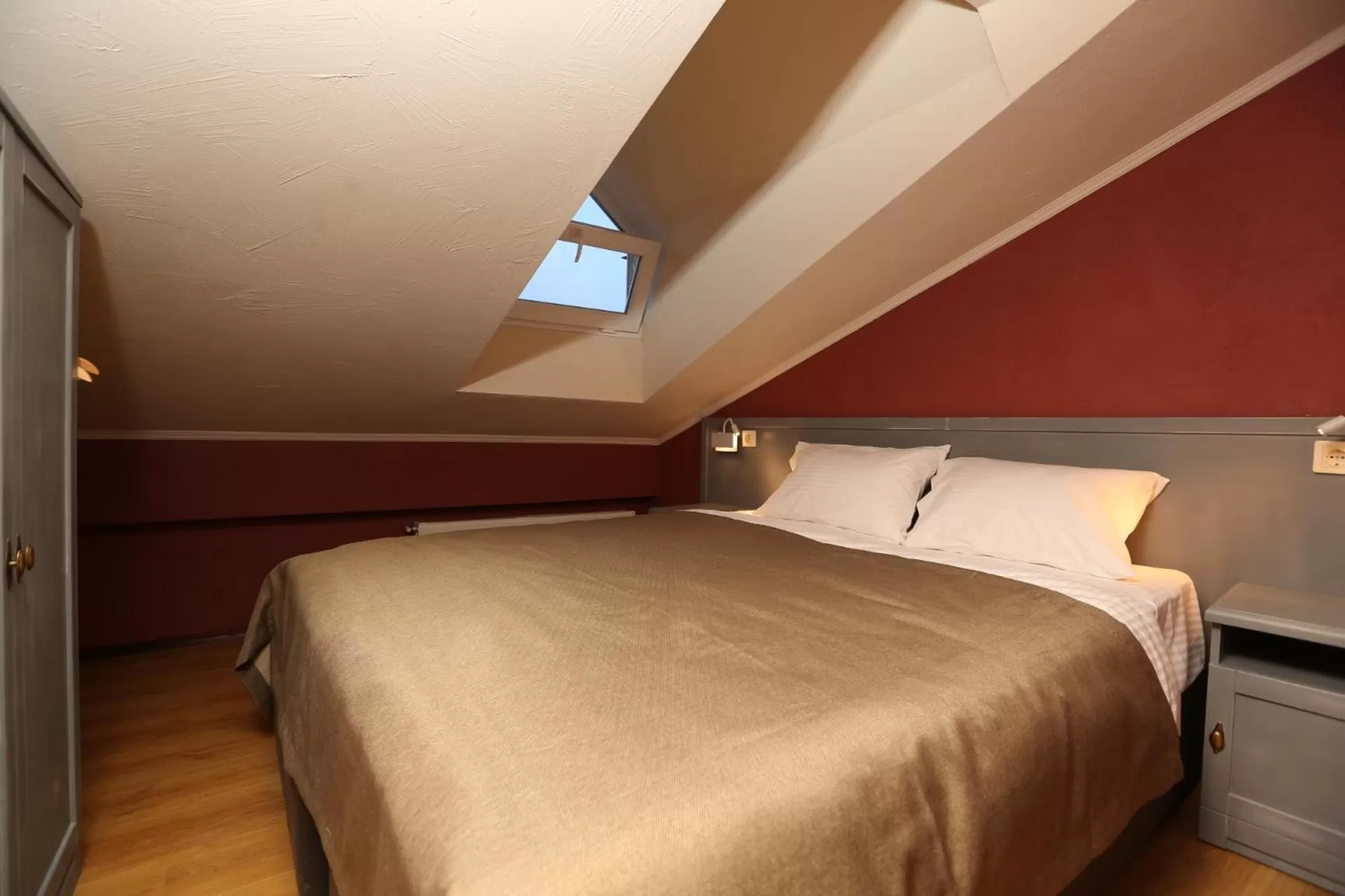 Bed in Kindli Boutique Hotel