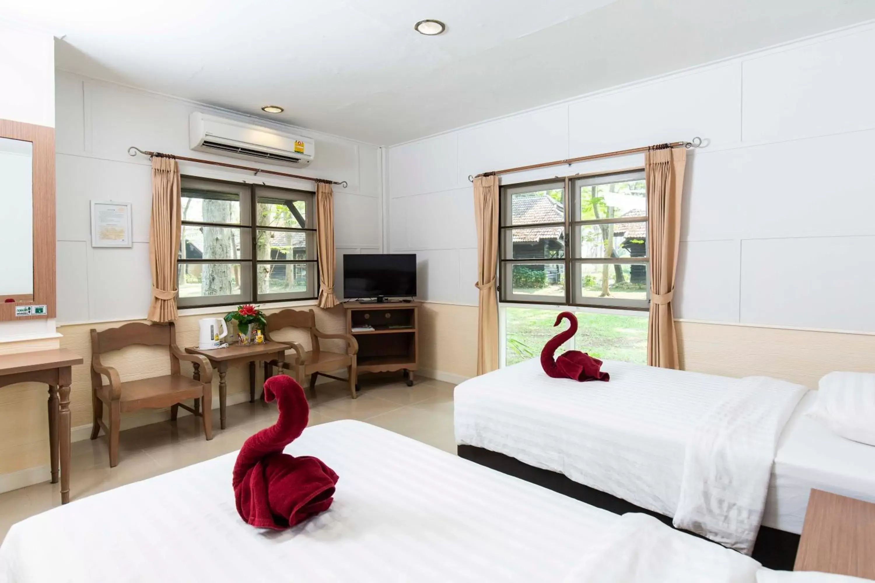 Bed in The Legacy River Kwai Resort Bed in The Legacy River Kwai Resort