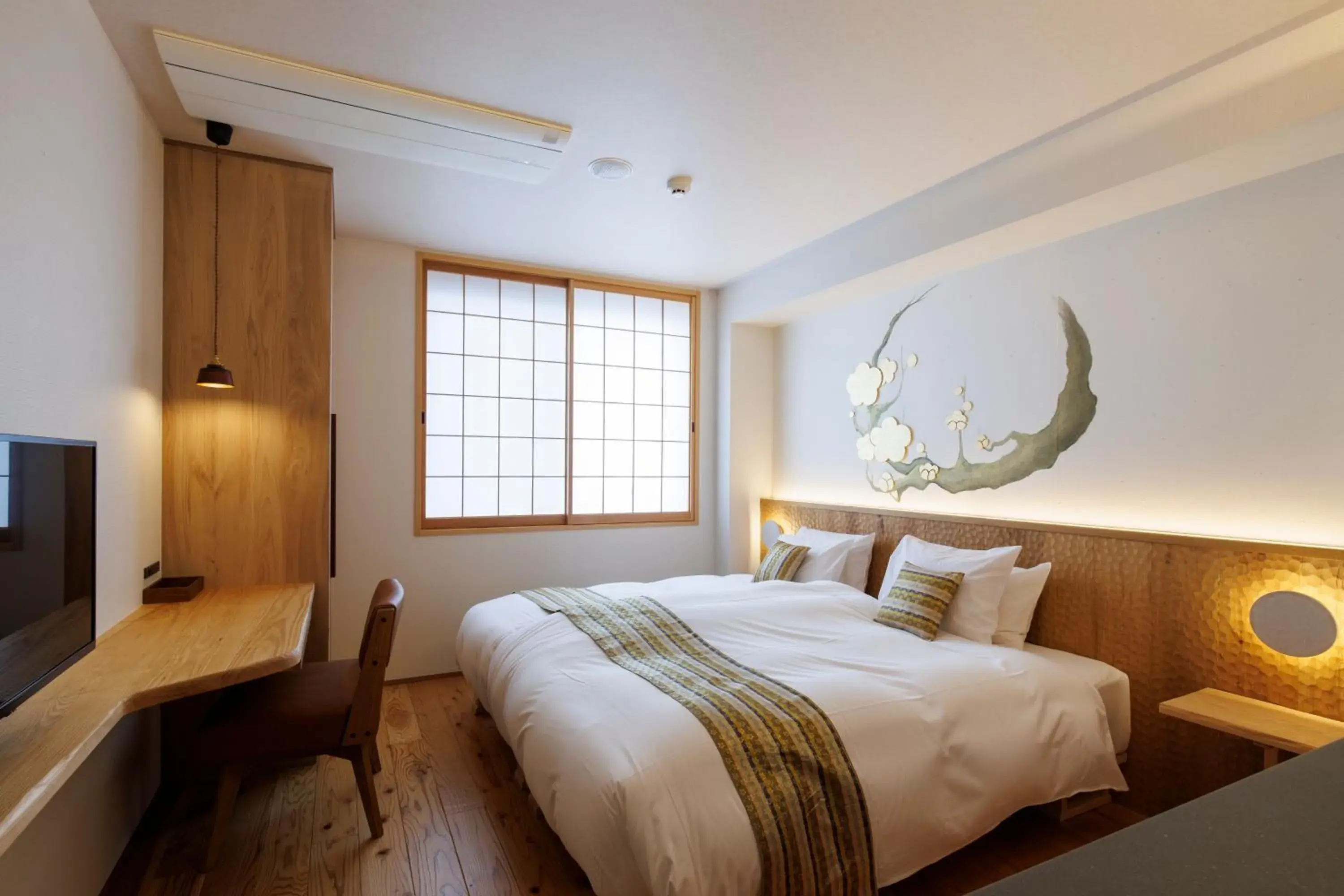 Bed in Hotel Kanazawa Zoushi