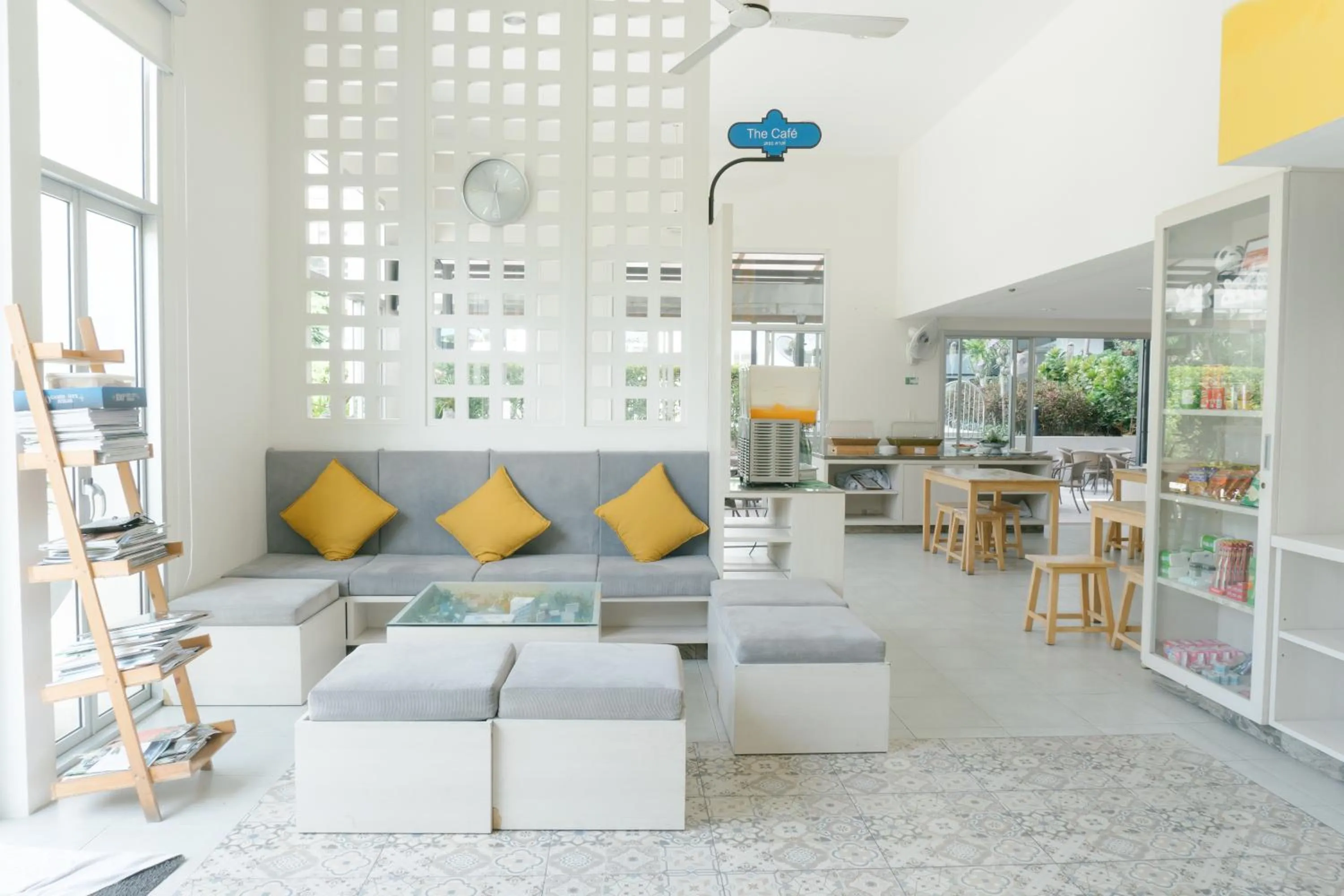 Seating area in Recenta Phuket Suanluang by Deevana