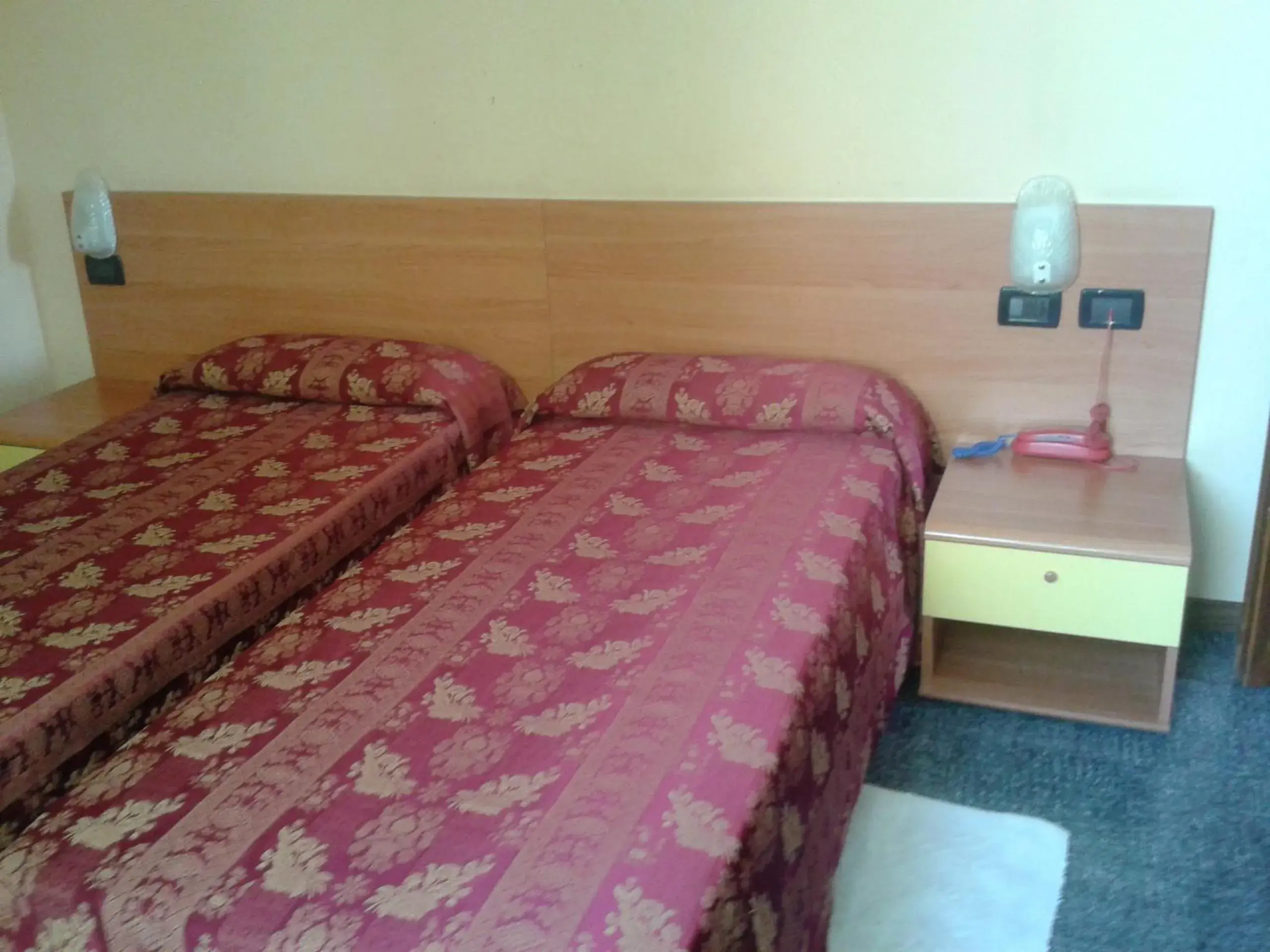 Bed in Hotel San Geminiano