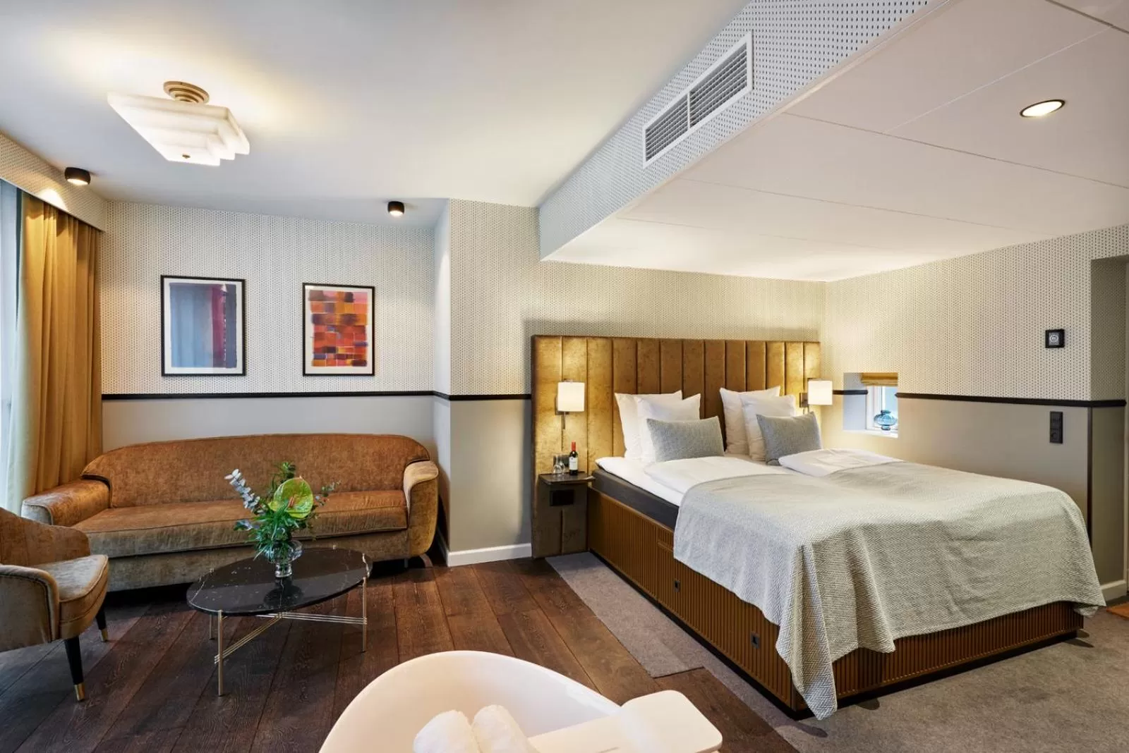 Living room, Bed in WIDE Hotel