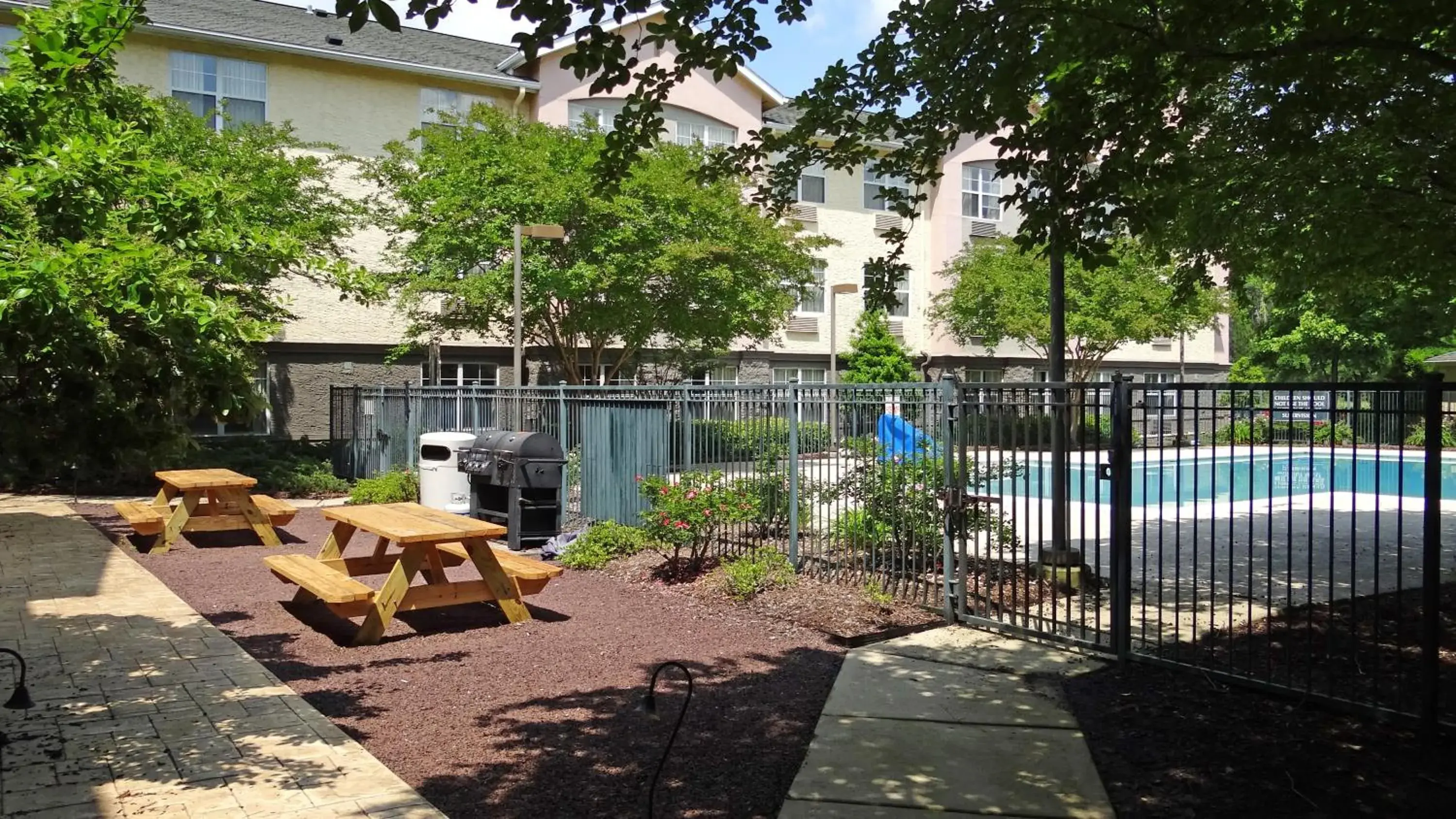 Patio, Swimming Pool in Extended Stay America Suites - Raleigh - RTP - 4919 Miami Blvd