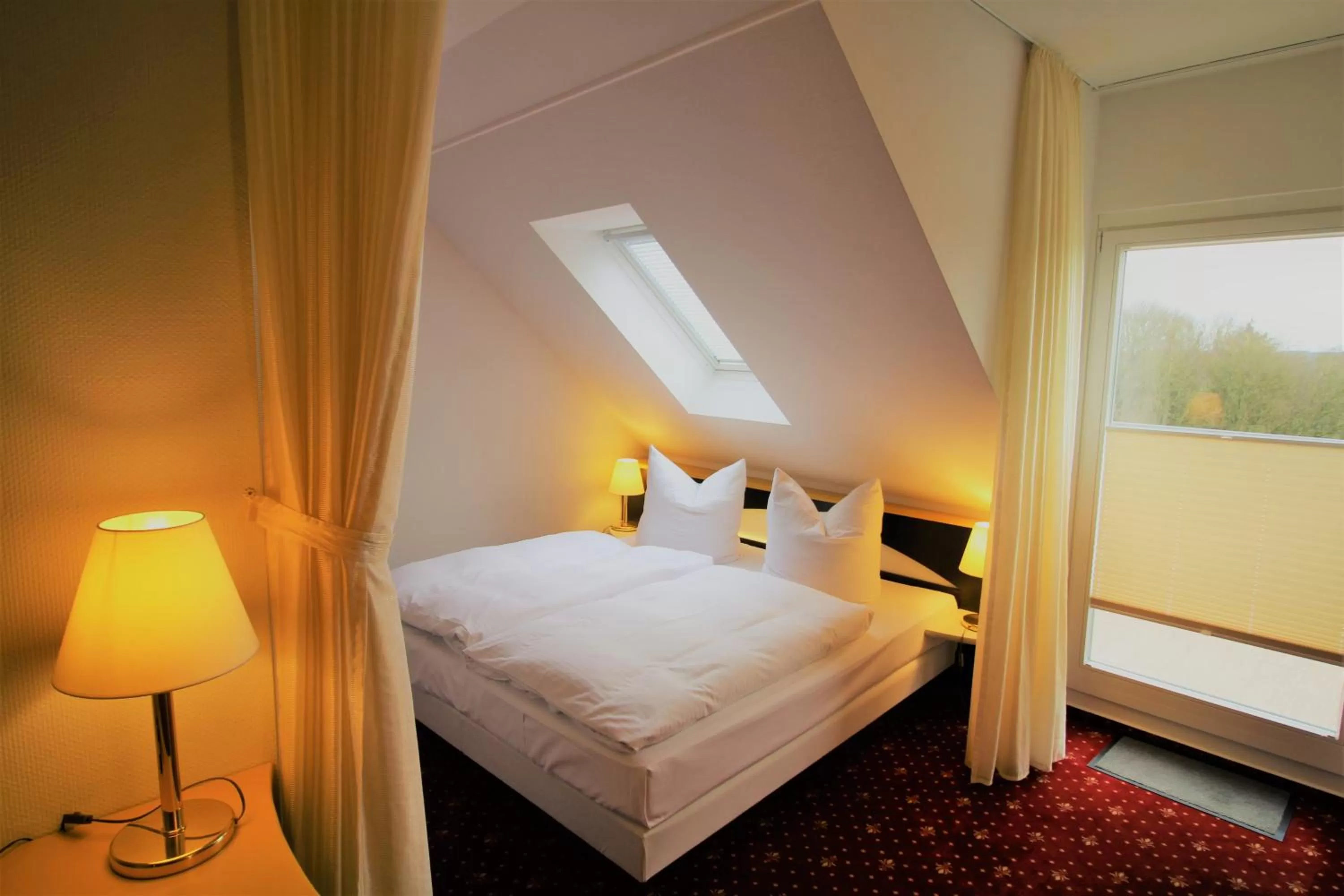 Photo of the whole room, Bed in Parkhotel Klüschenberg