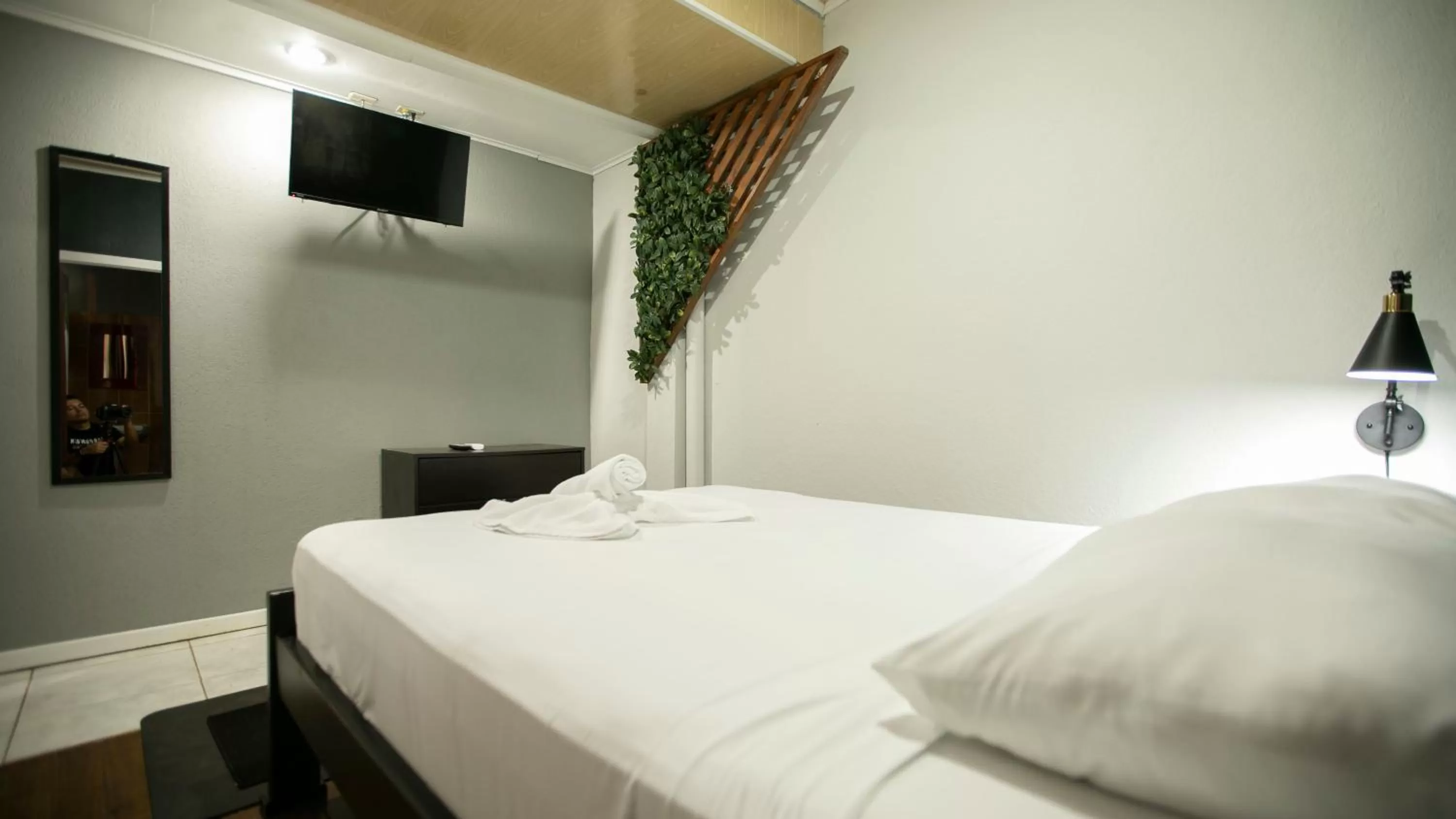 Bed in Coati Arenal Lodge