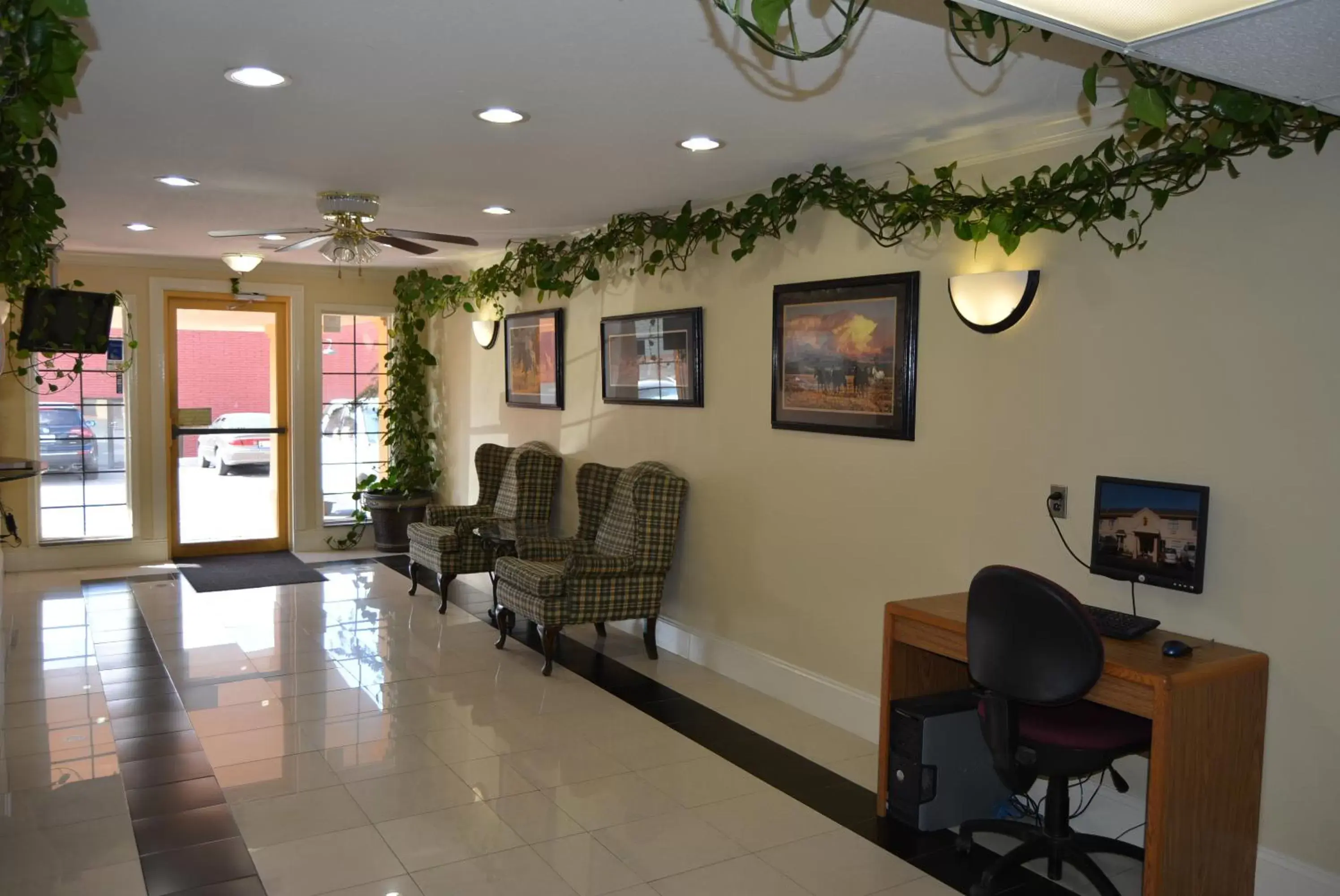 Lobby or reception in Super 8 by Wyndham Sulphur Lobby or reception in Super 8 by Wyndham Sulphur