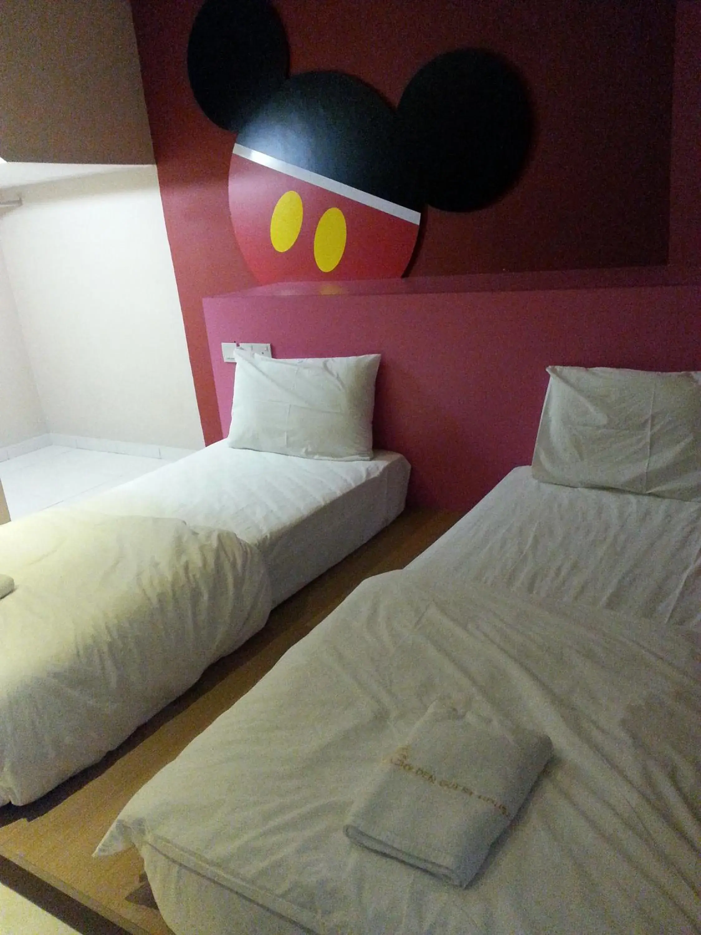 Bed in GOLDEN GUEST HOUSE KUANTAN