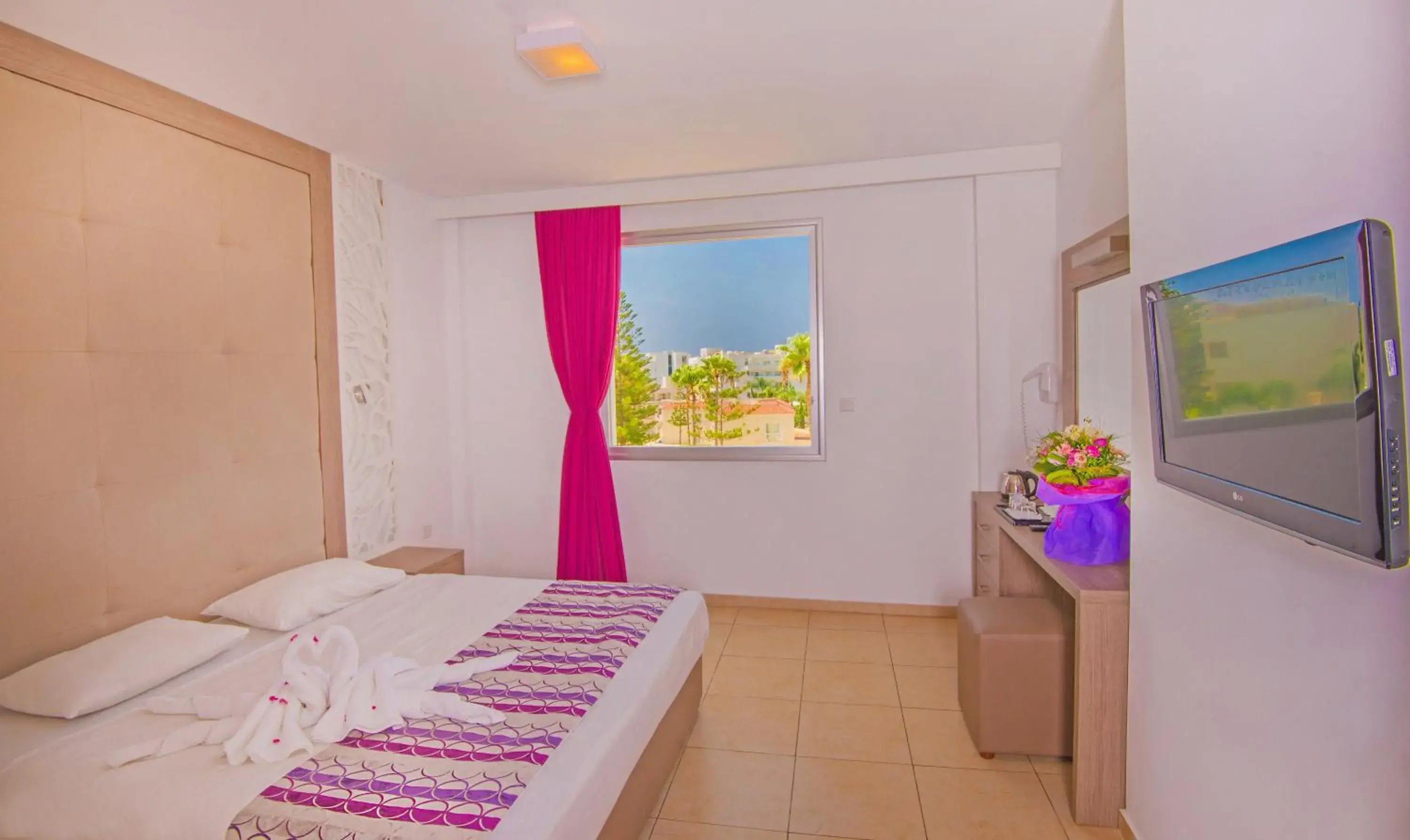 Bed in New Famagusta Hotel & Suites