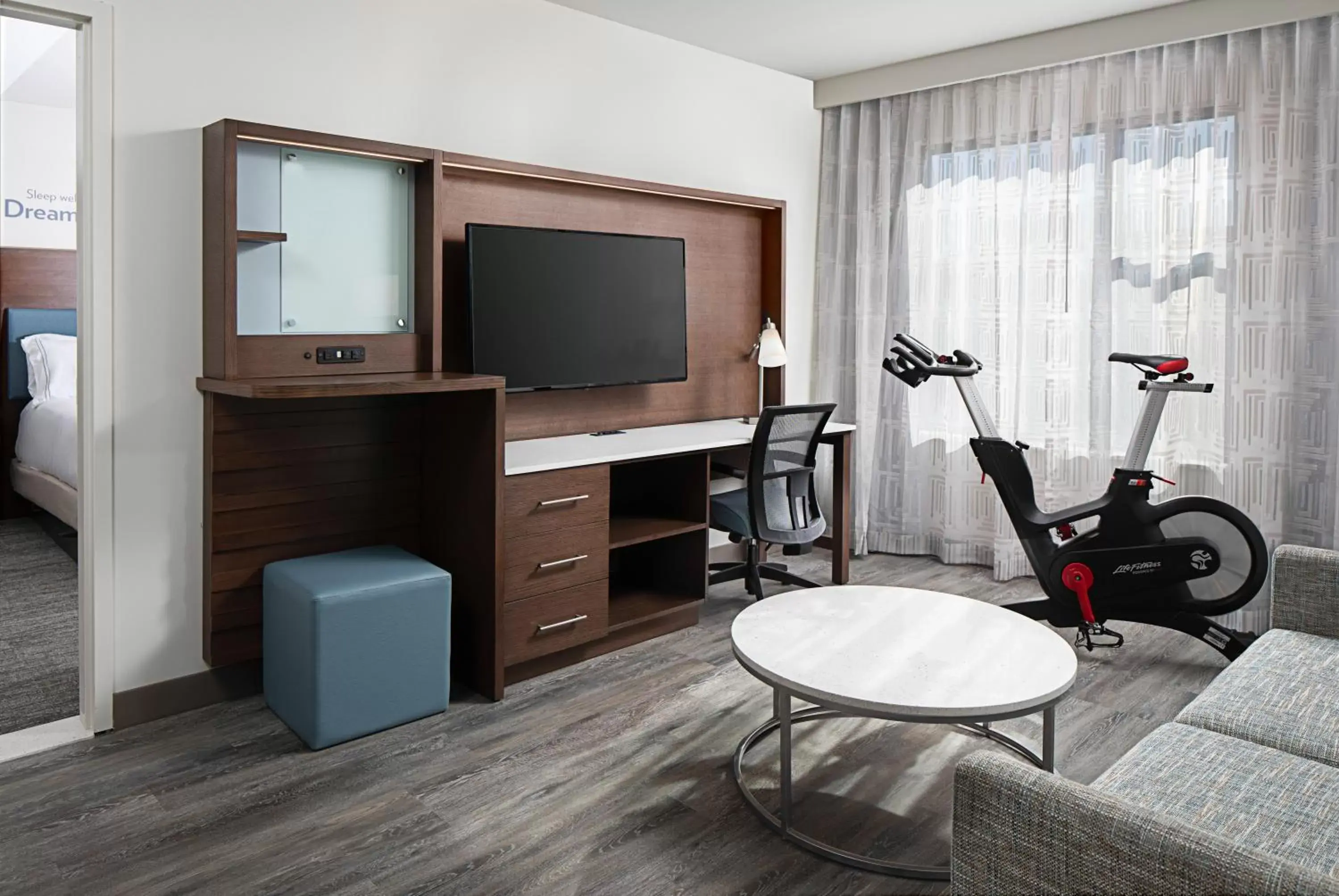 Bedroom, TV/Entertainment Center in EVEN Hotel Alpharetta - Avalon Area, an IHG Hotel