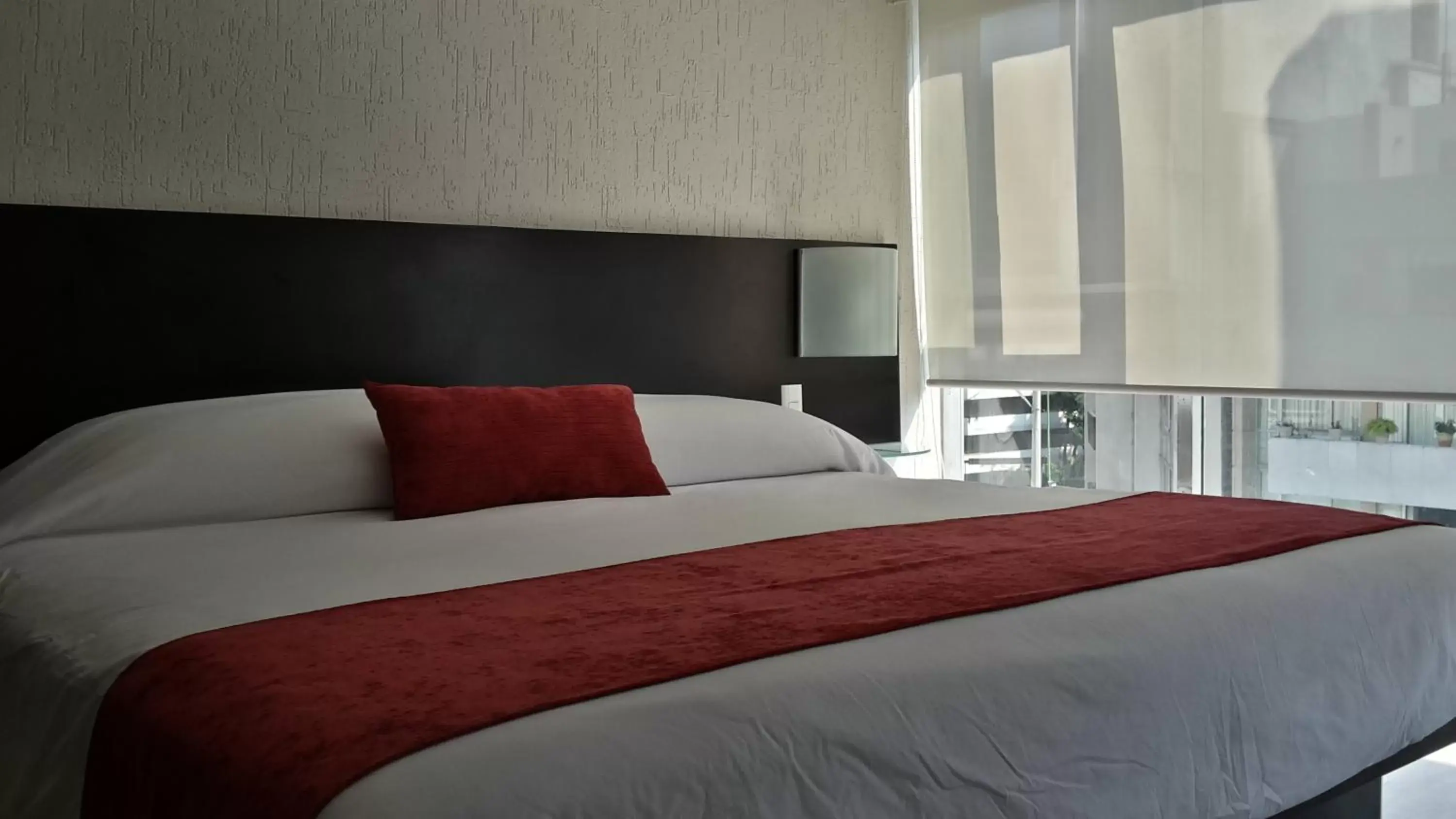 Bed, Room Photo in Grupo Kings Suites -Monte Chimborazo 537