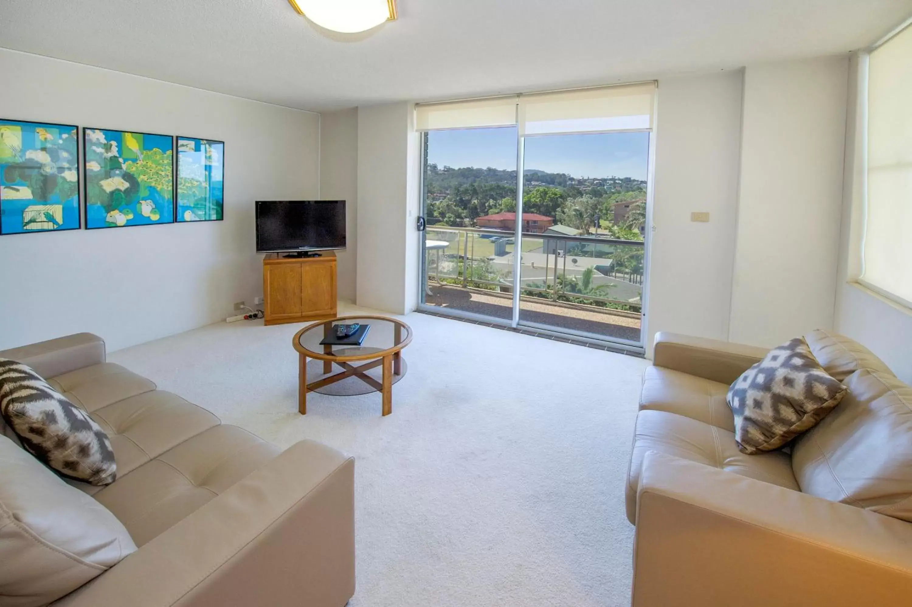 Living room, Seating Area in Tradewinds Apartments