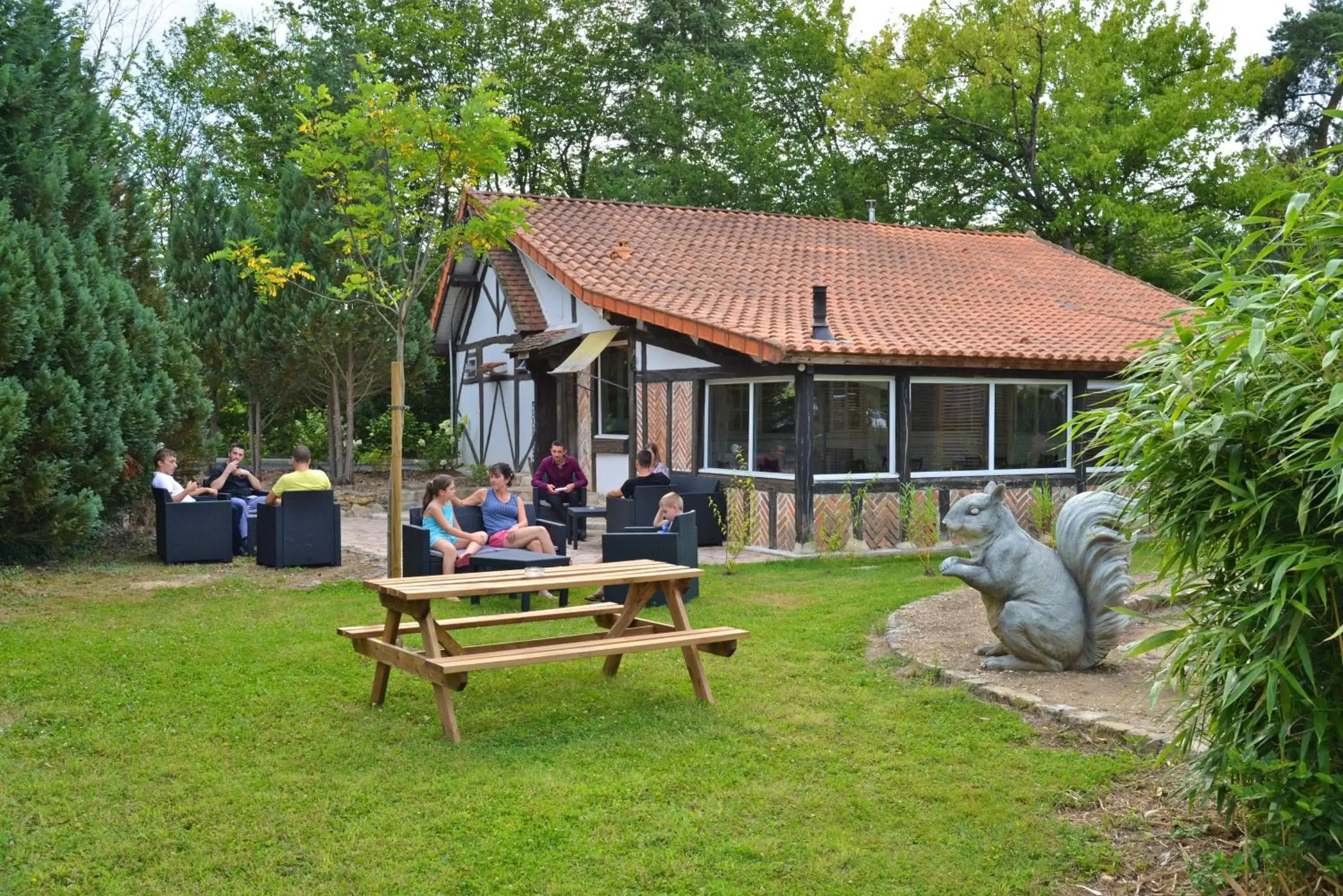 Patio in Logis - Hotel Restaurant La Mire