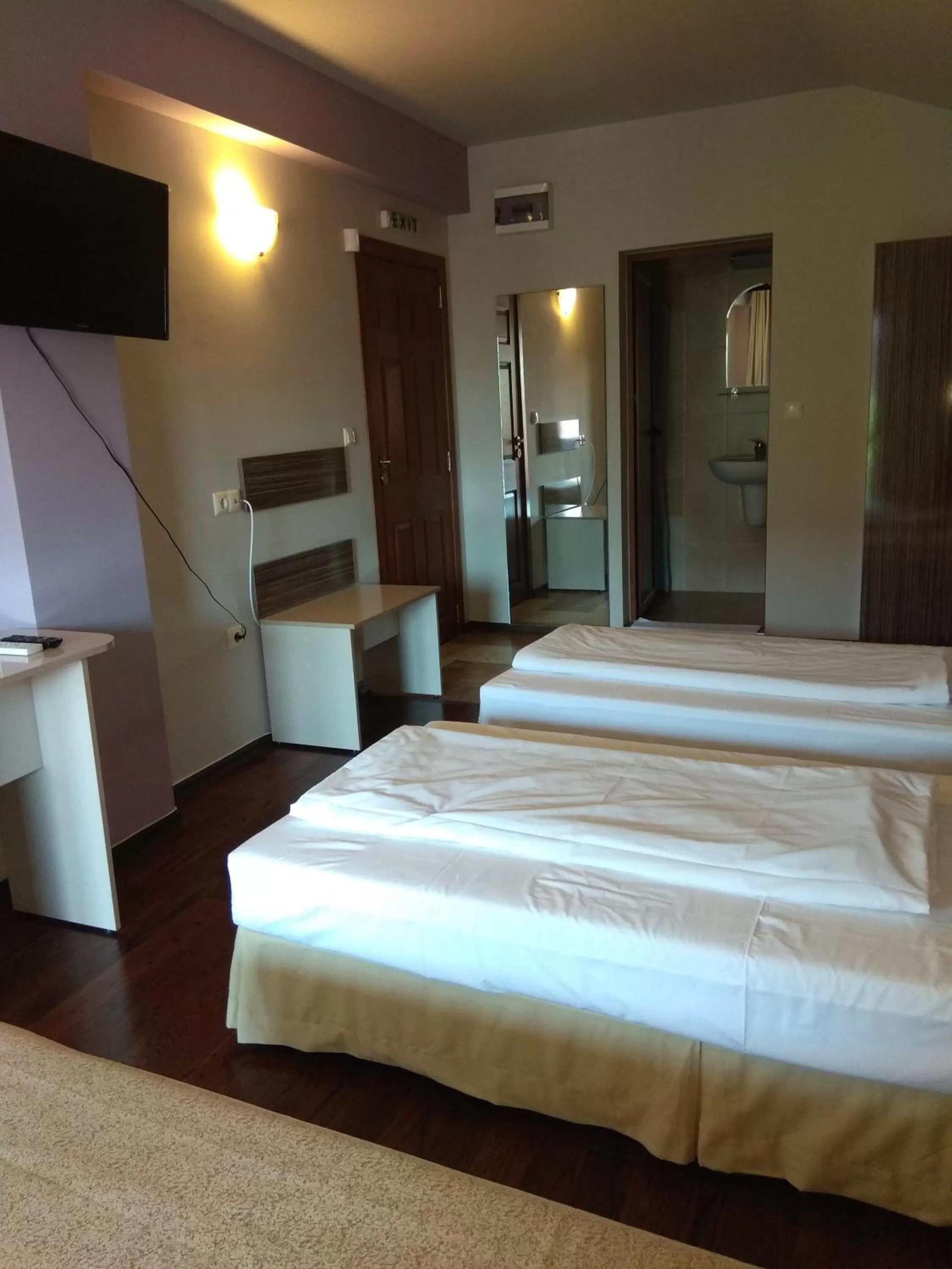 Bed in Roots Hotel and Wine Bar