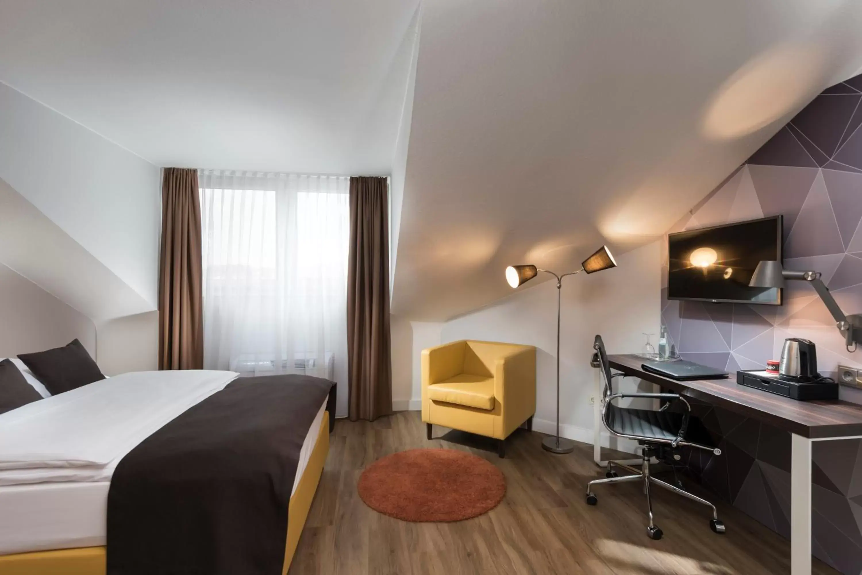 TV and multimedia, TV/Entertainment Center in Best Western Hotel Mannheim City