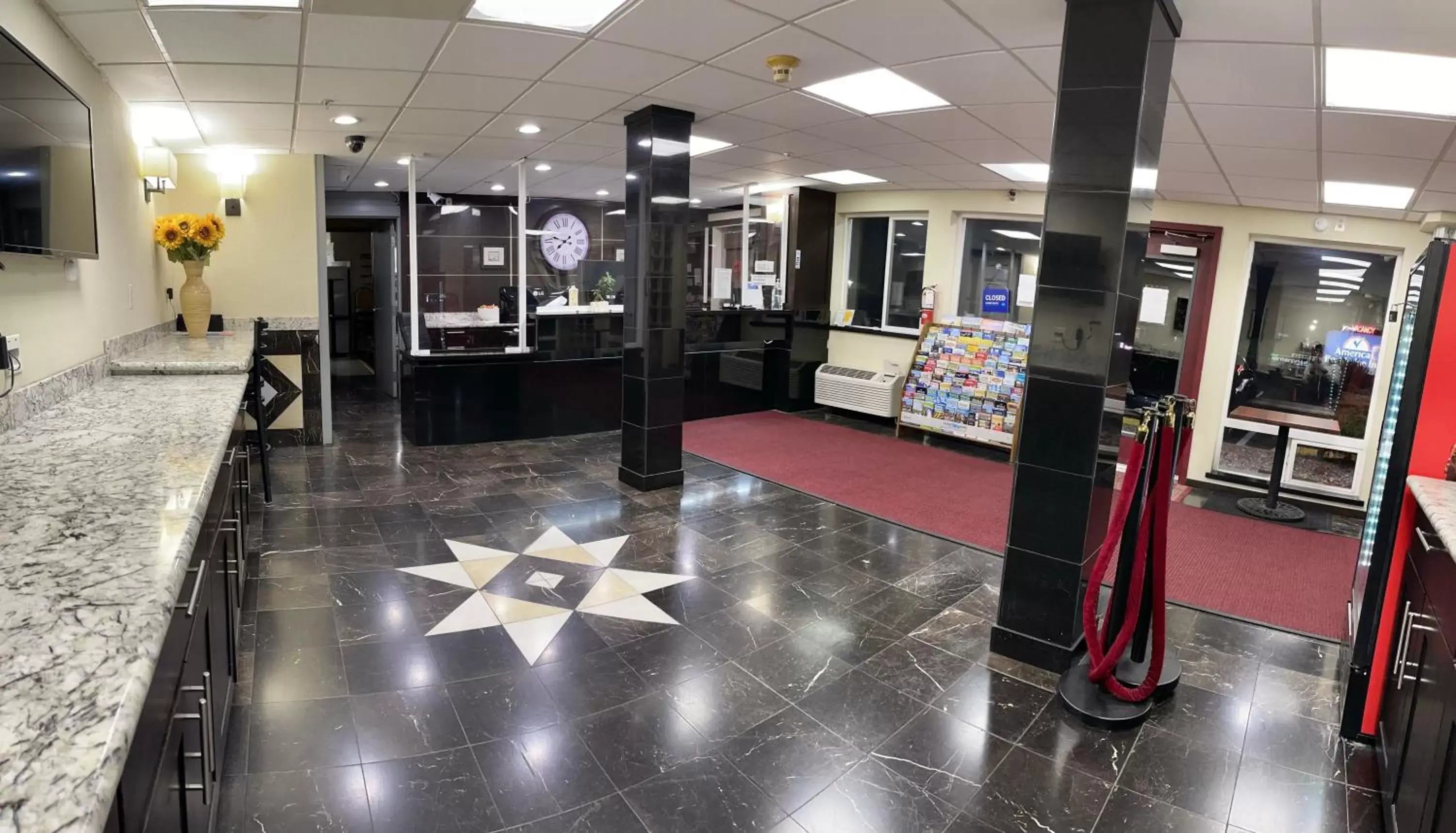 Property building in Americas Inn & Suite Property building in Americas Inn & Suite