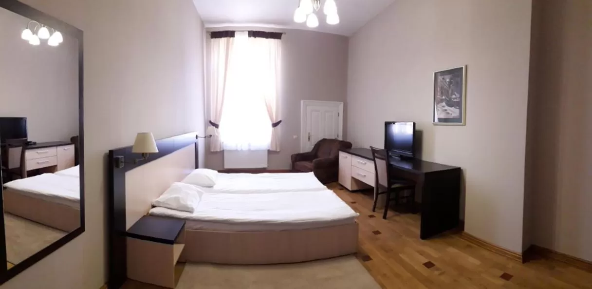 Bed in Mini-Hotel Under The Roof