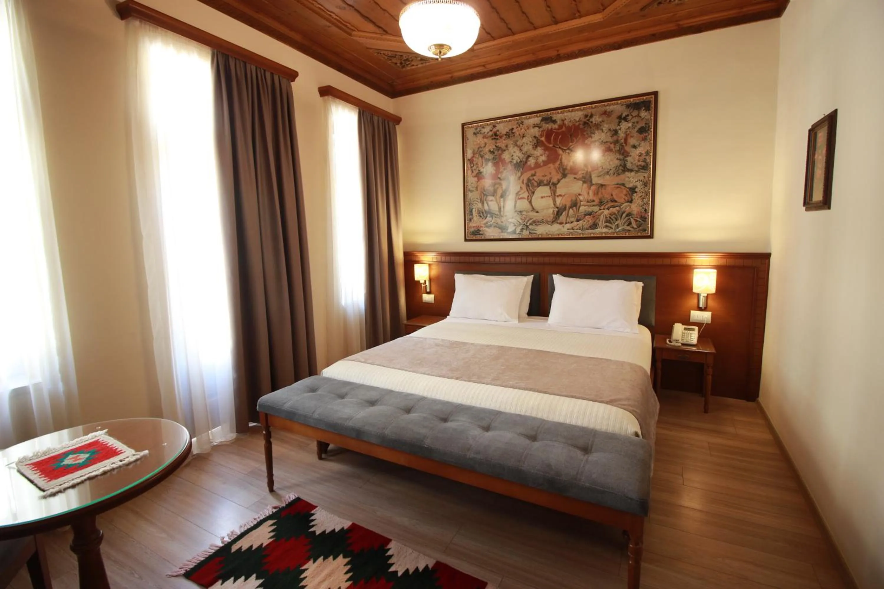 Bed in Hotel Argjiro