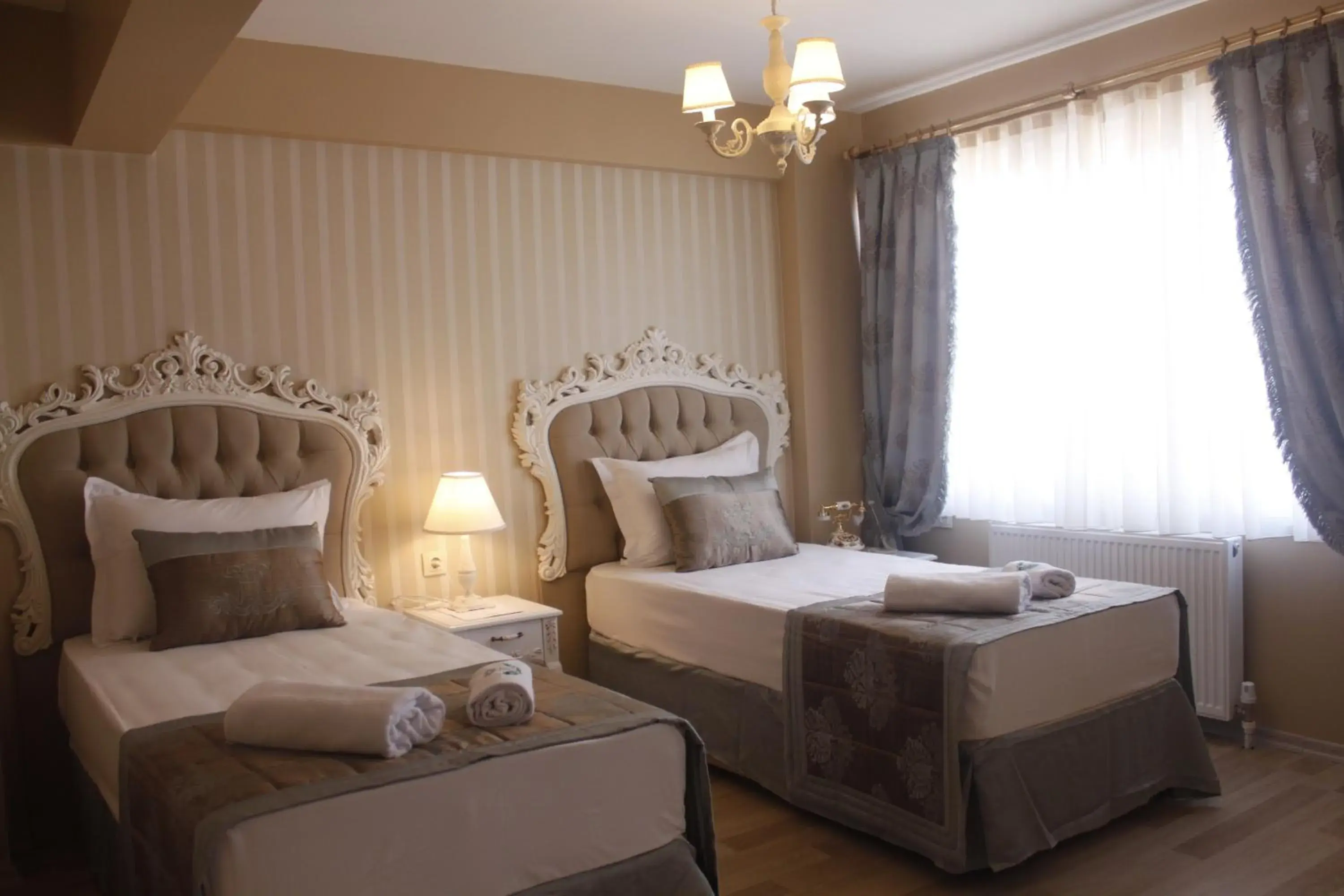 Bedroom, Bed in Divani Ali Hotel