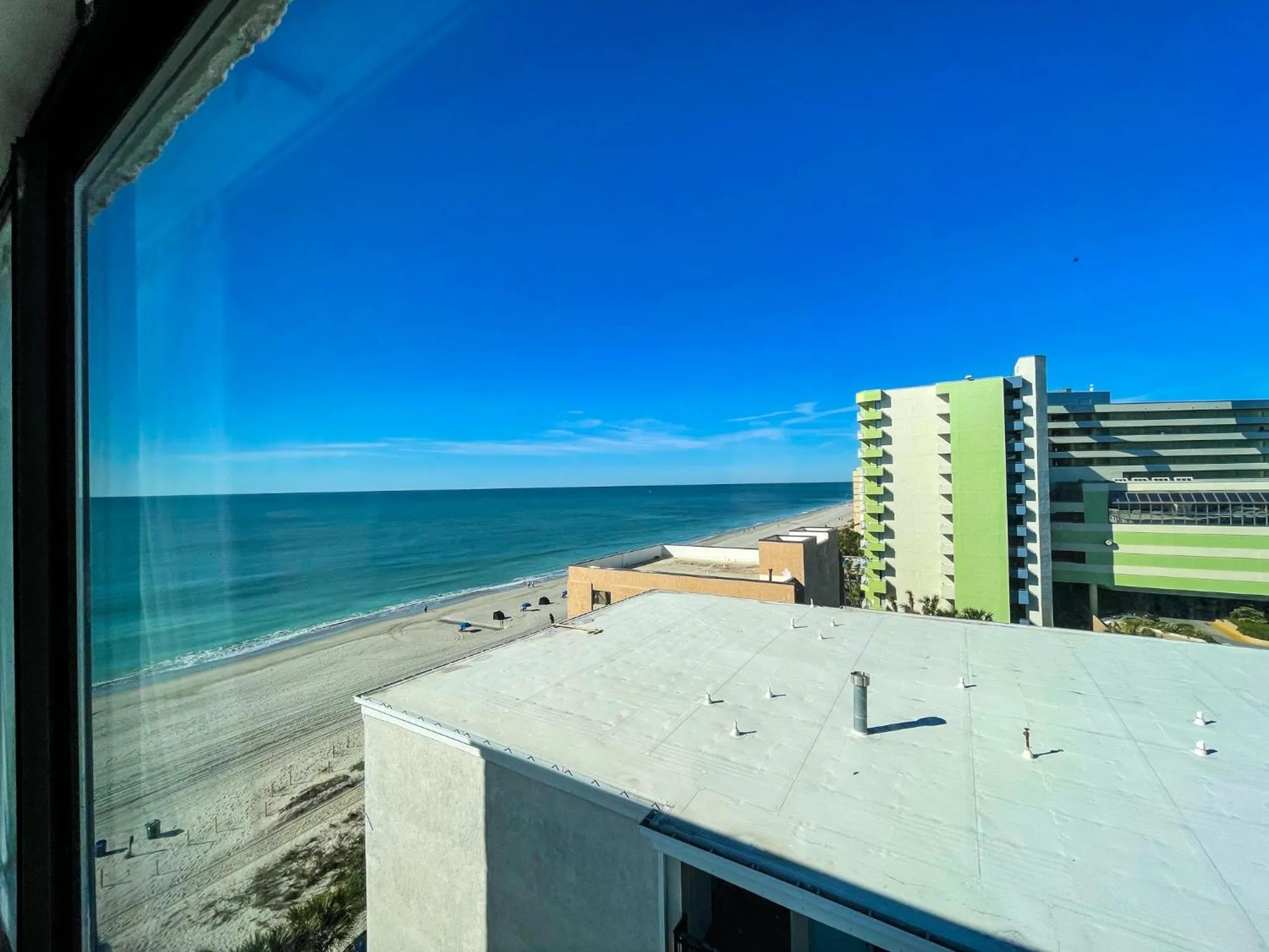 Side View Queen Room  in Polynesian Oceanfront Hotel