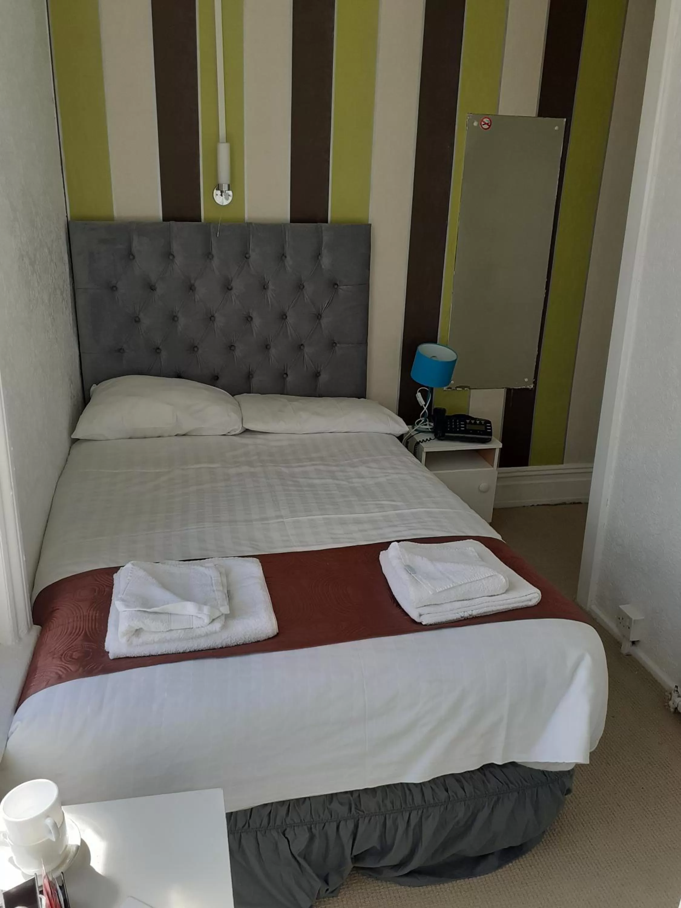 Bed in The Coastal Bay Hotel