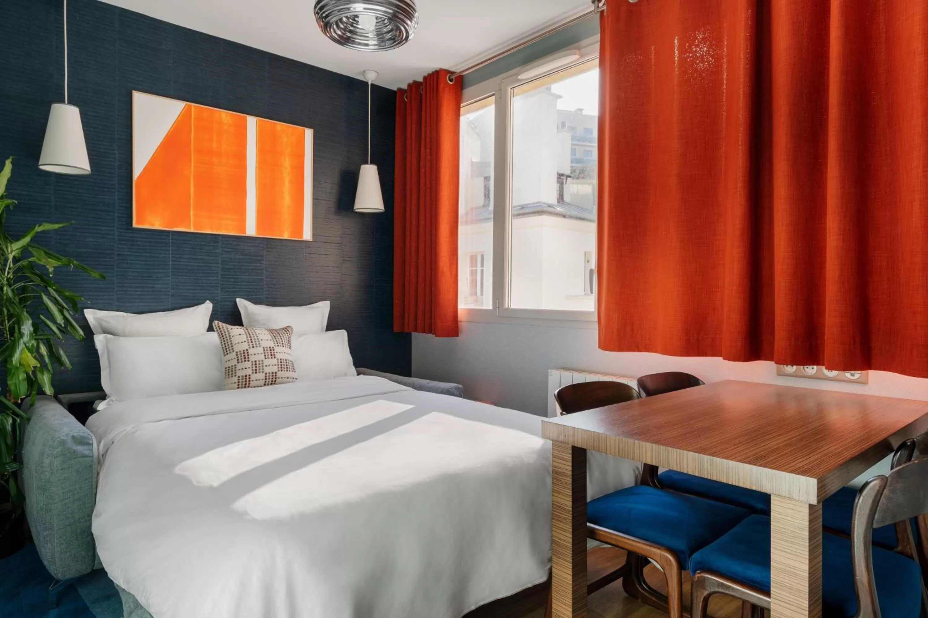 Living room, Bed in Edgar Suites Expo Paris Porte de Versailles