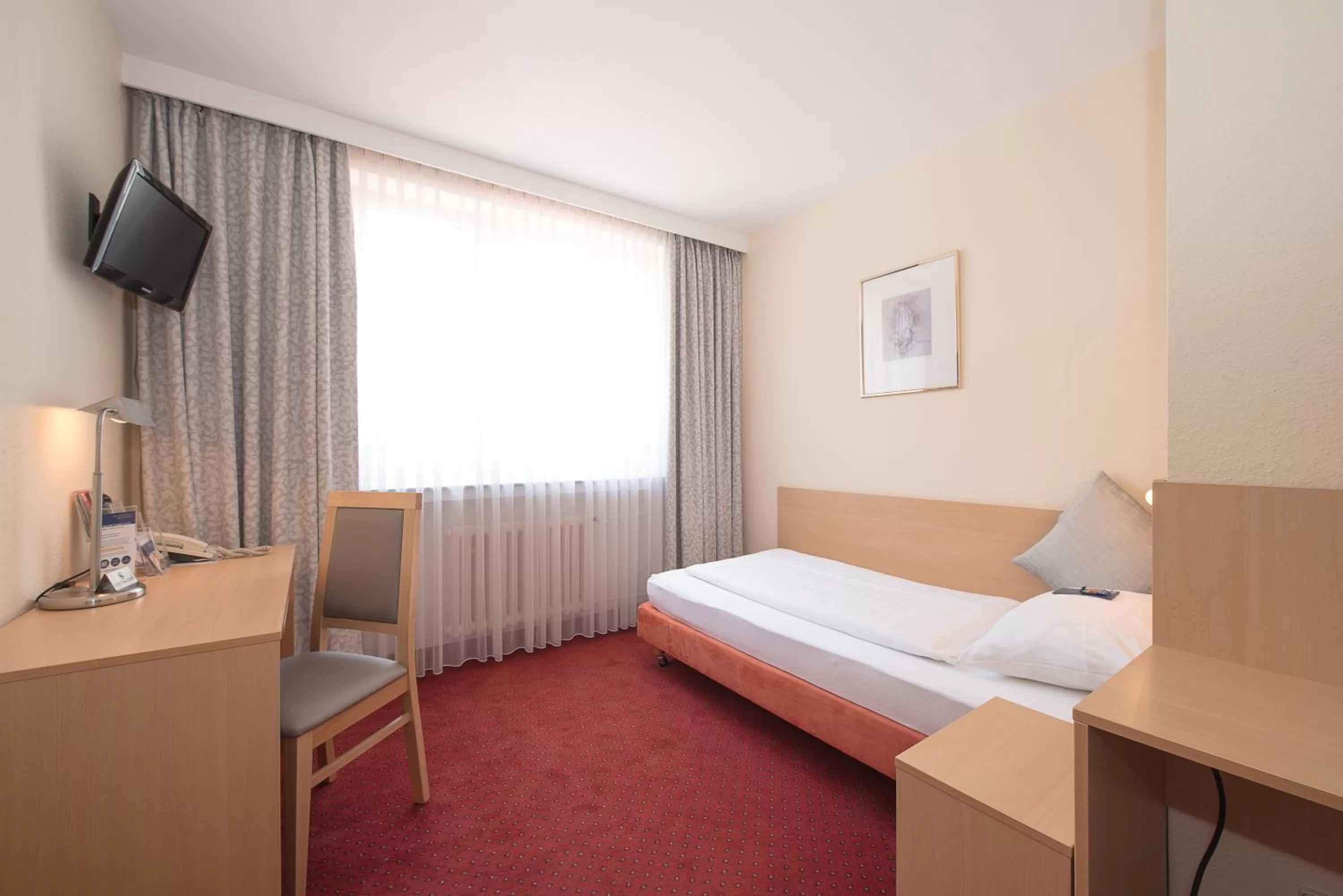 Photo of the whole room, Bed in Comfort Garni Stadtzentrum Hotel