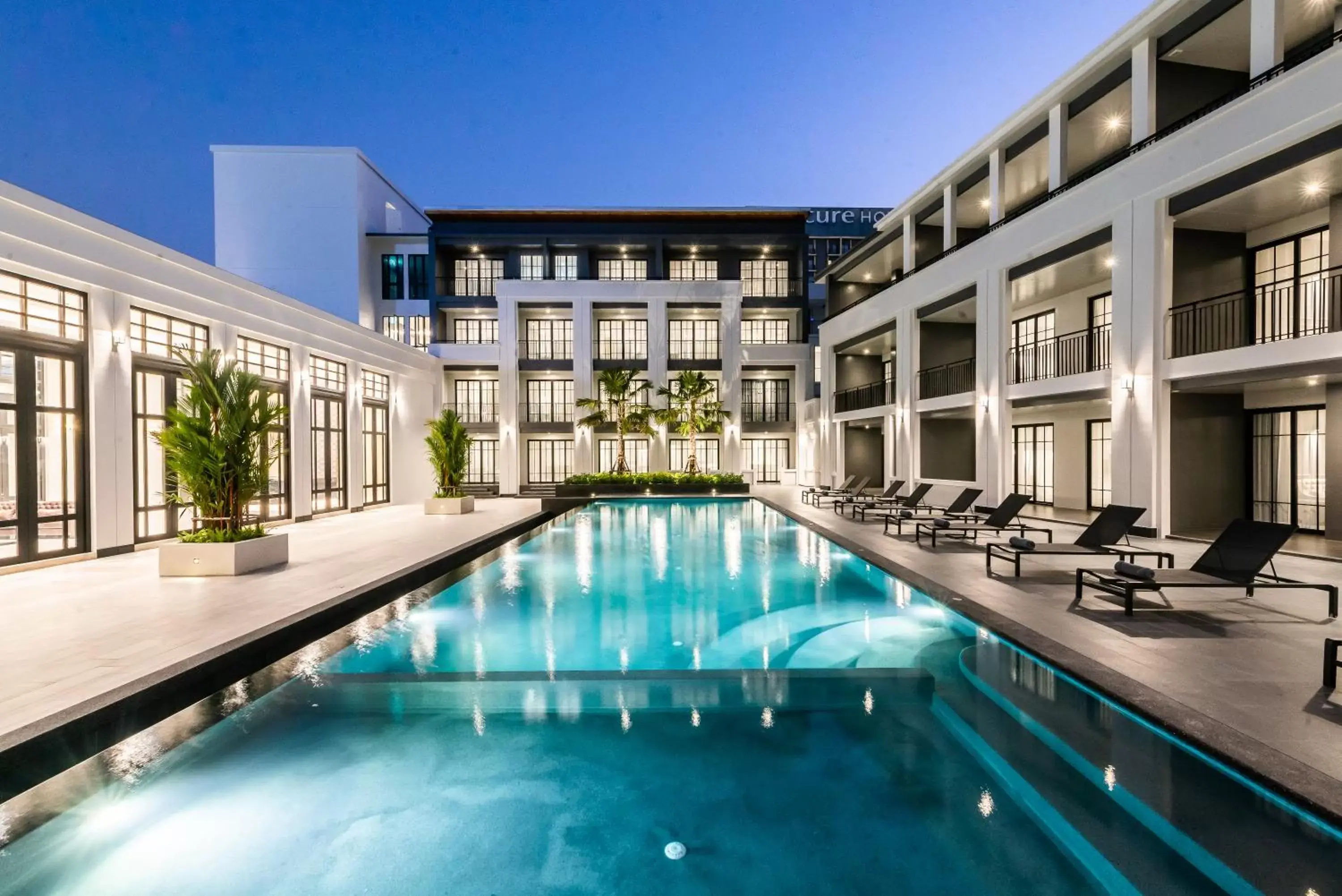 Swimming pool in One Patio Hotel Pattaya - SHA Extra Plus Swimming pool in One Patio Hotel Pattaya - SHA Extra Plus