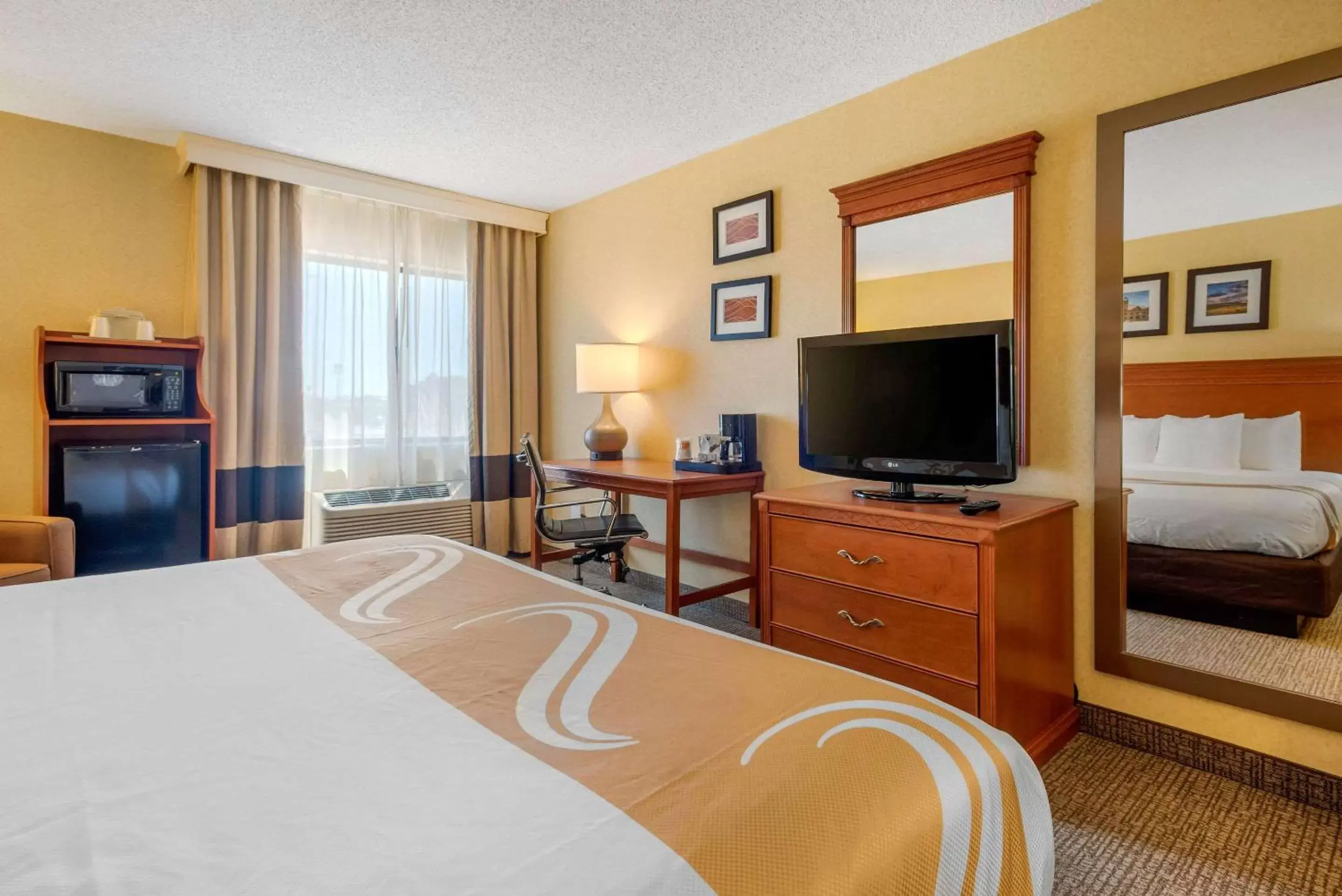 Photo of the whole room, TV/Entertainment Center in Quality Inn I-25