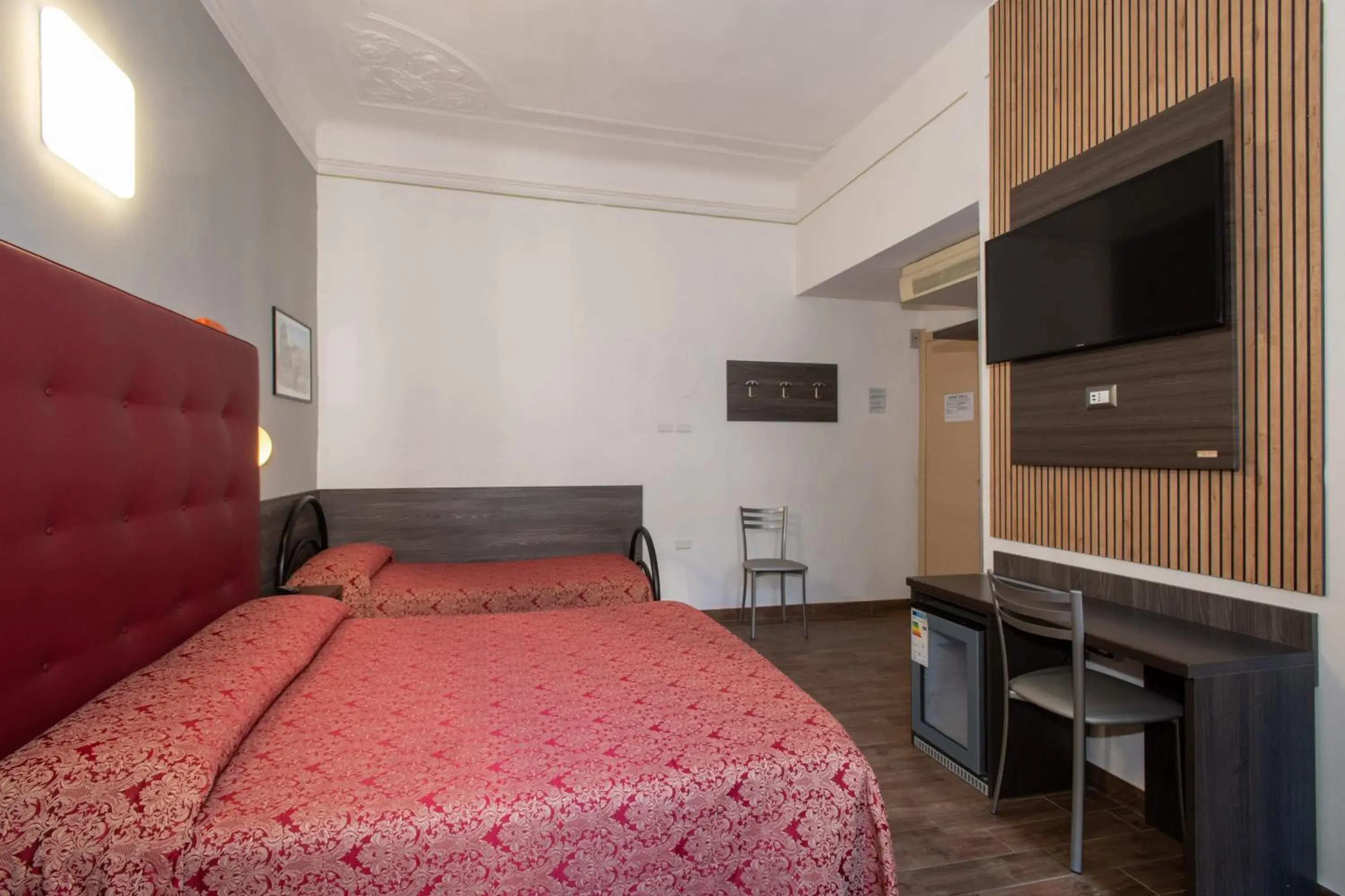 Bed in Hotel Piola