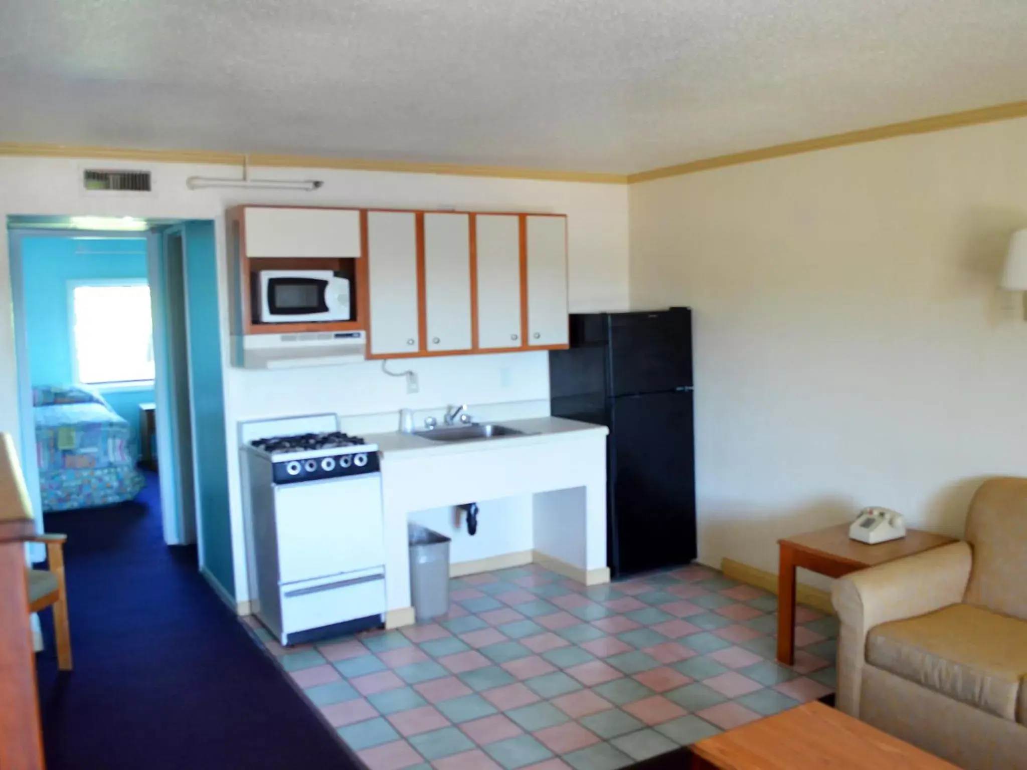 Kitchen or kitchenette, Kitchen/Kitchenette in Cerca Del Mar Motel
