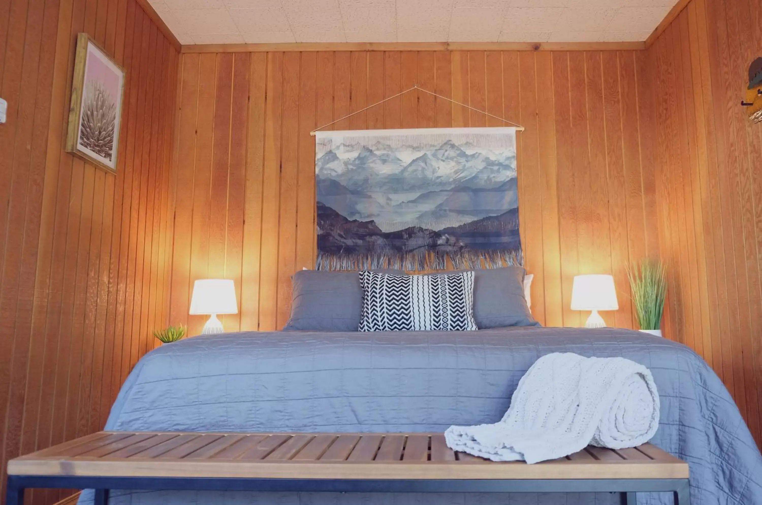 Bed in Lake Front Cabins