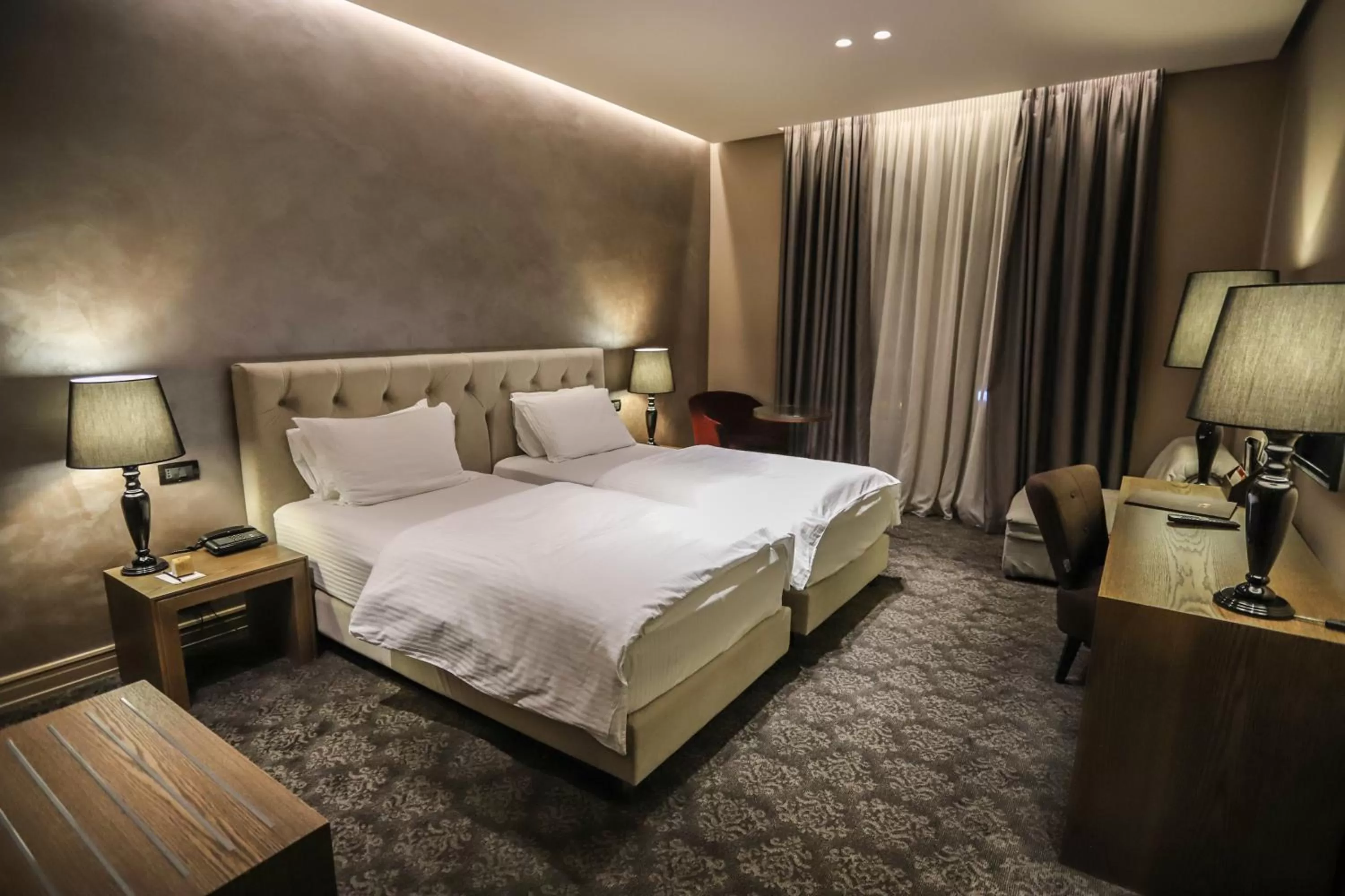 Bed in Mondial Hotel