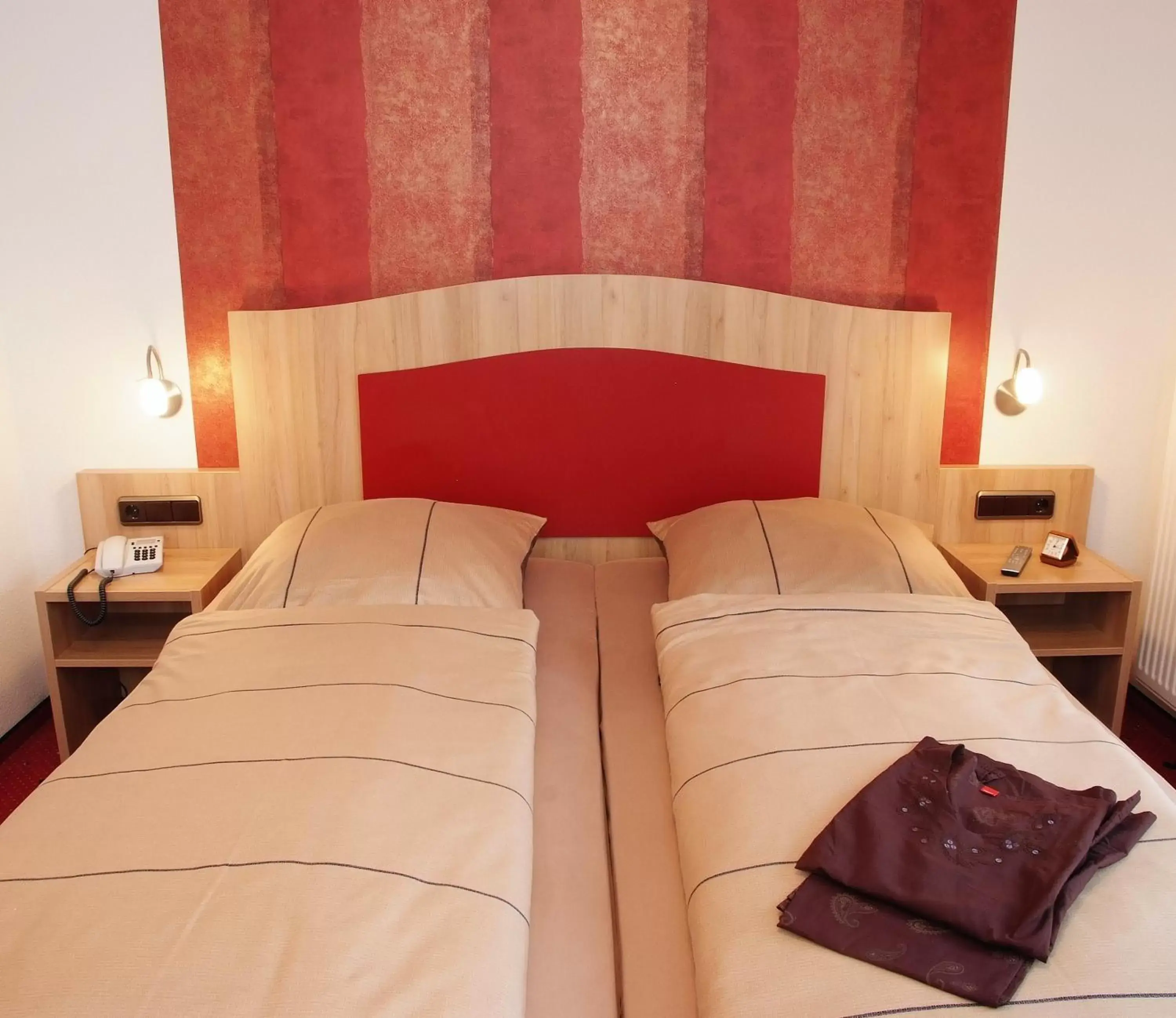 Bed in Hotel Rappen Rothenburg ob der Tauber