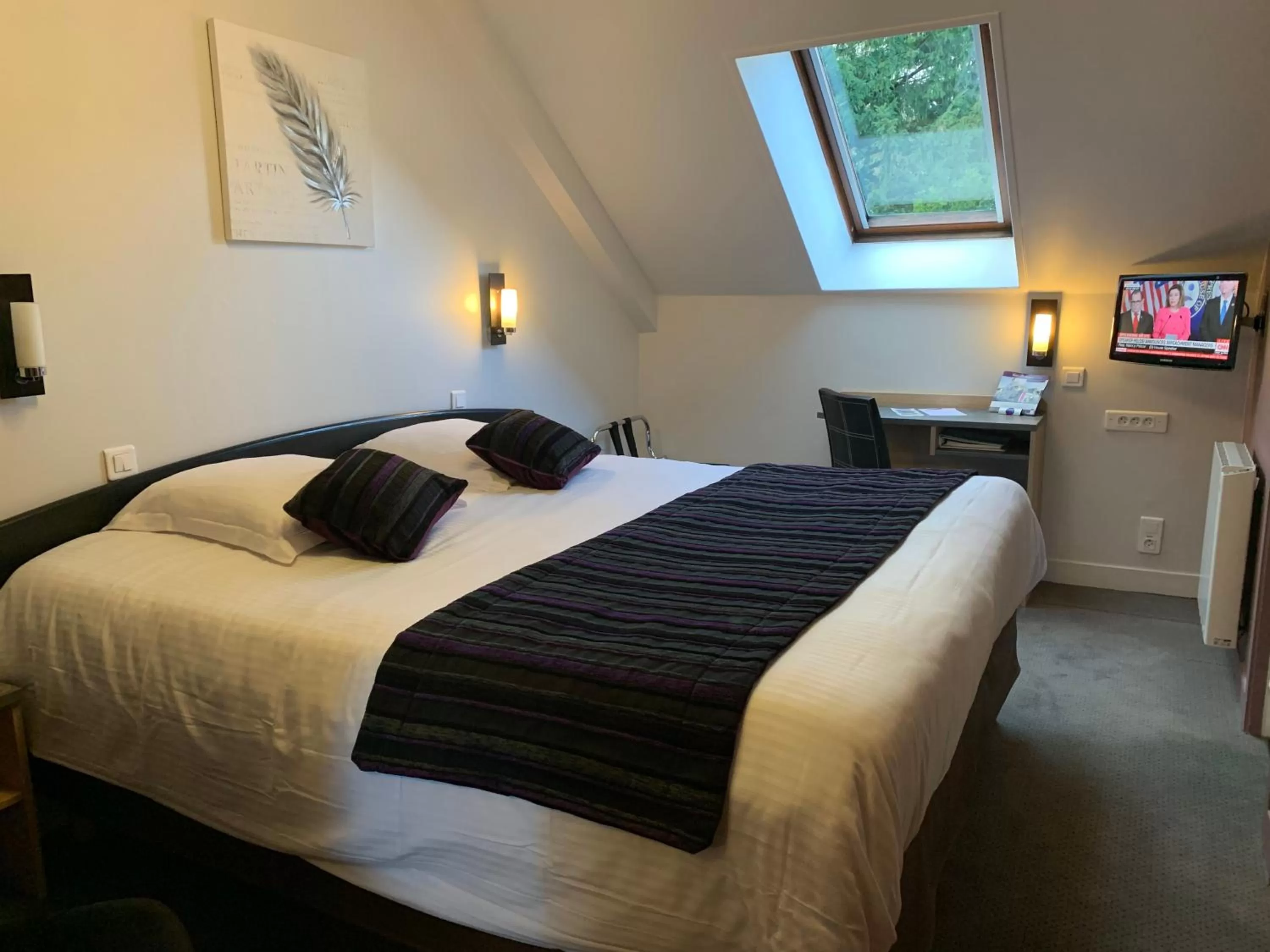 Photo of the whole room, Bed in Hôtel Le Bayeux