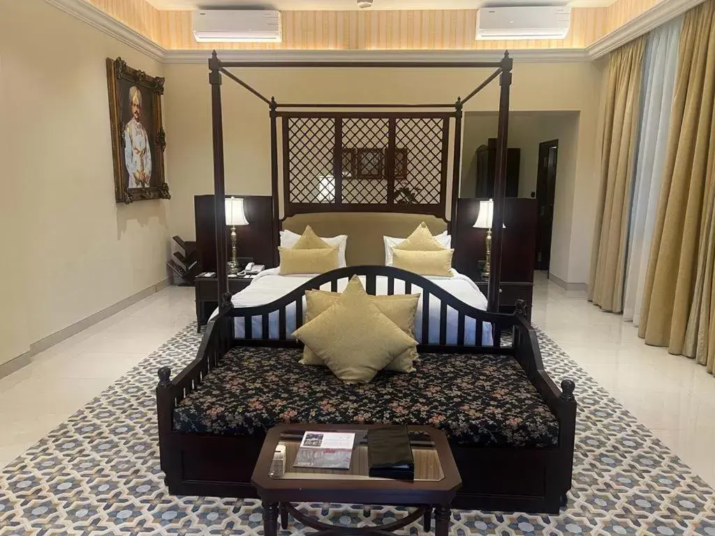 Bedroom, Bed in Royal Orchid Metropole Mysore