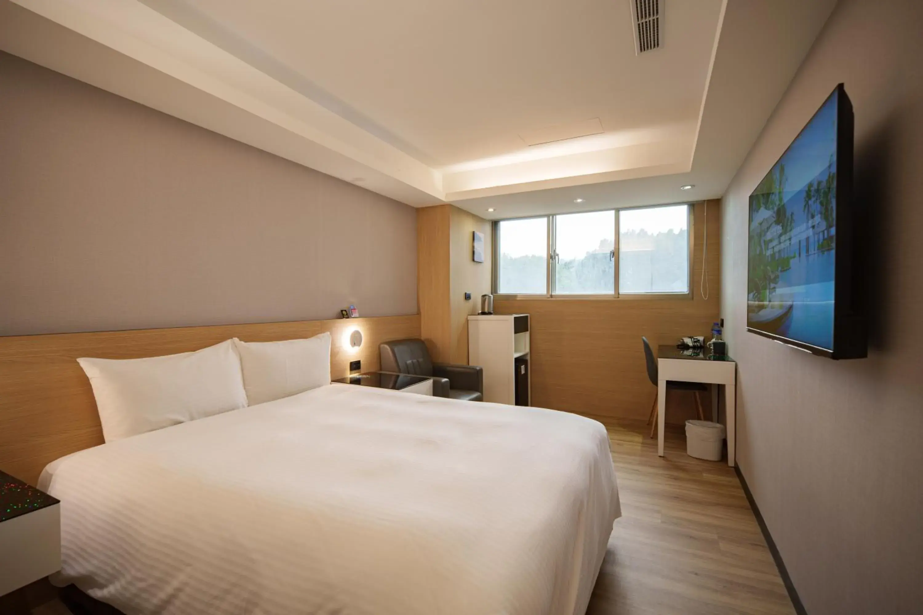 Bed in Hub Hotel Tucheng