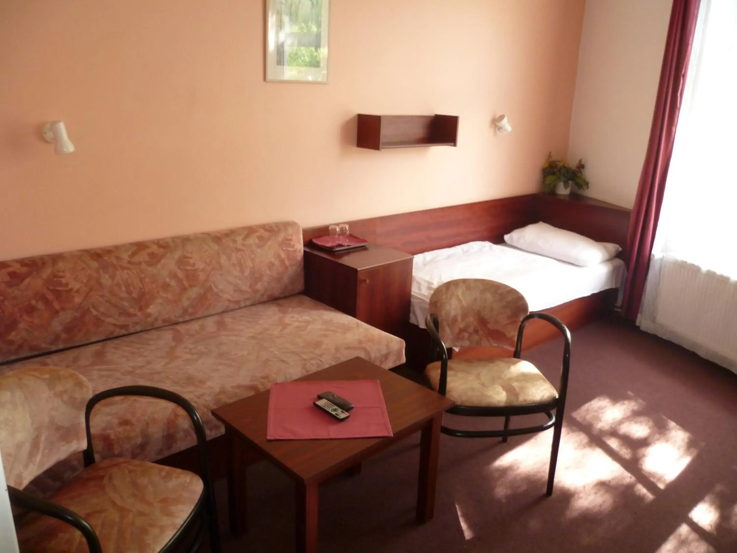 Bed, Seating Area in Hotel Jerabek