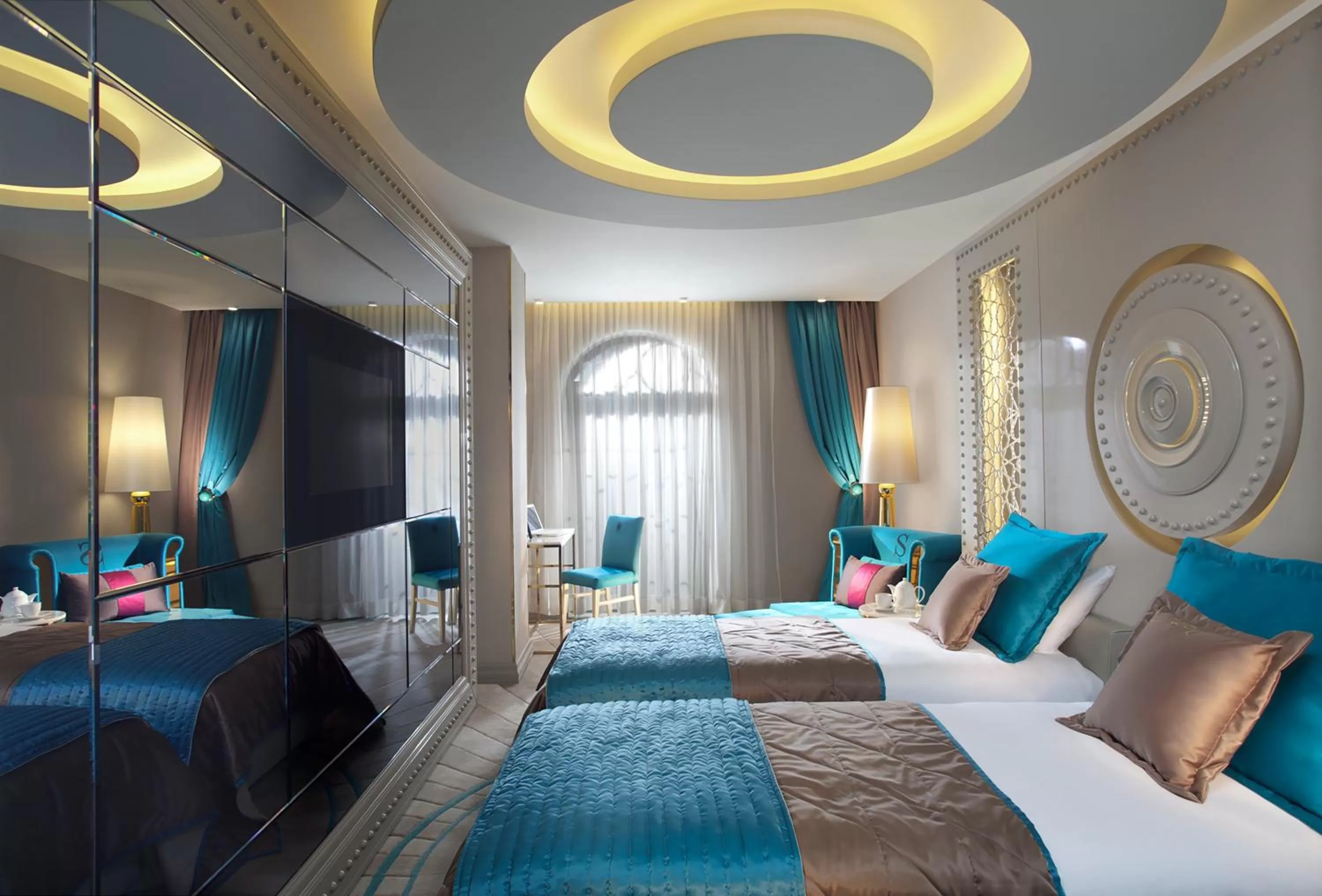 Bed in Sura Design Hotel & Suites