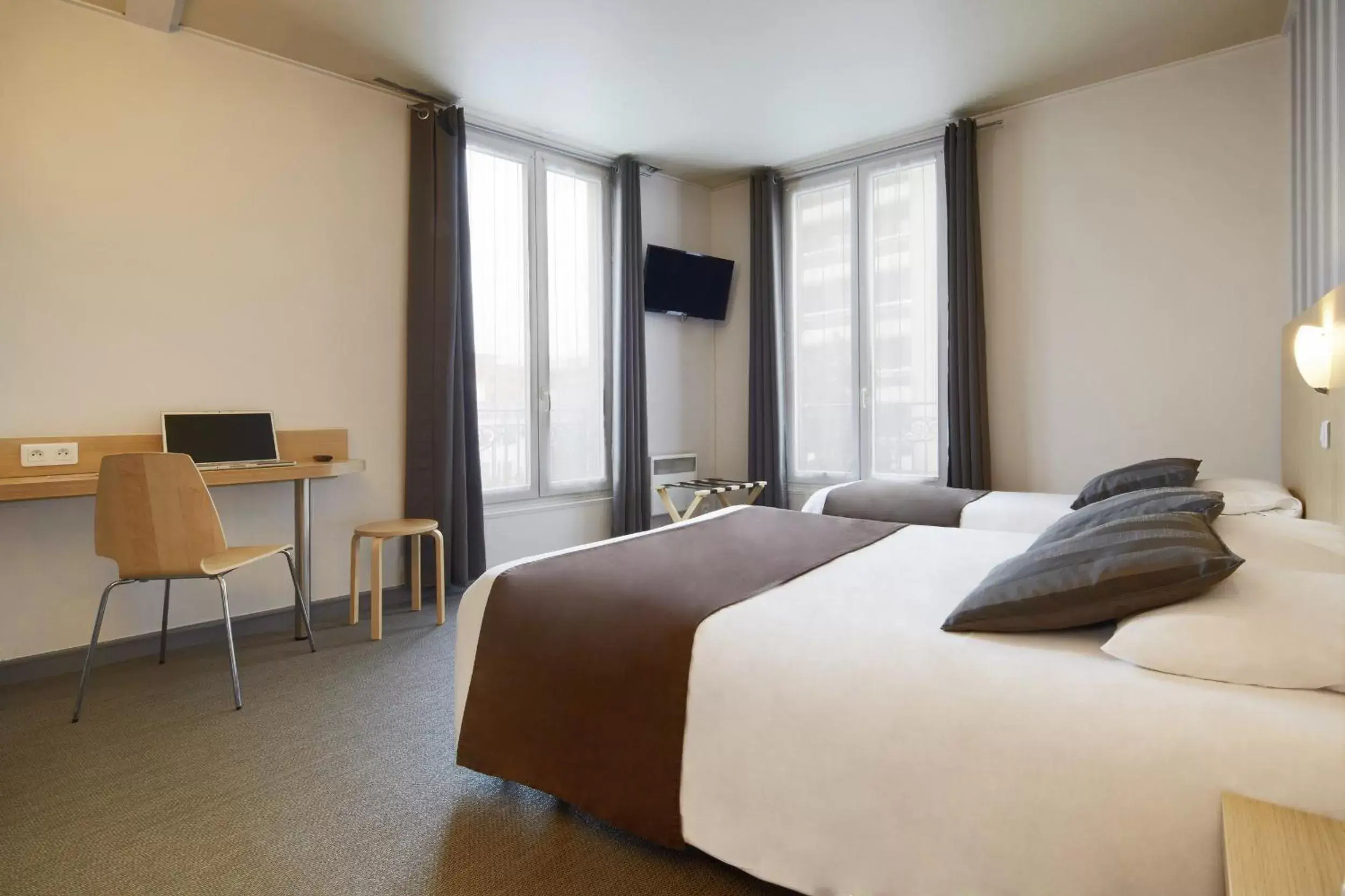 Photo of the whole room, Bed in Hotel Paris Villette