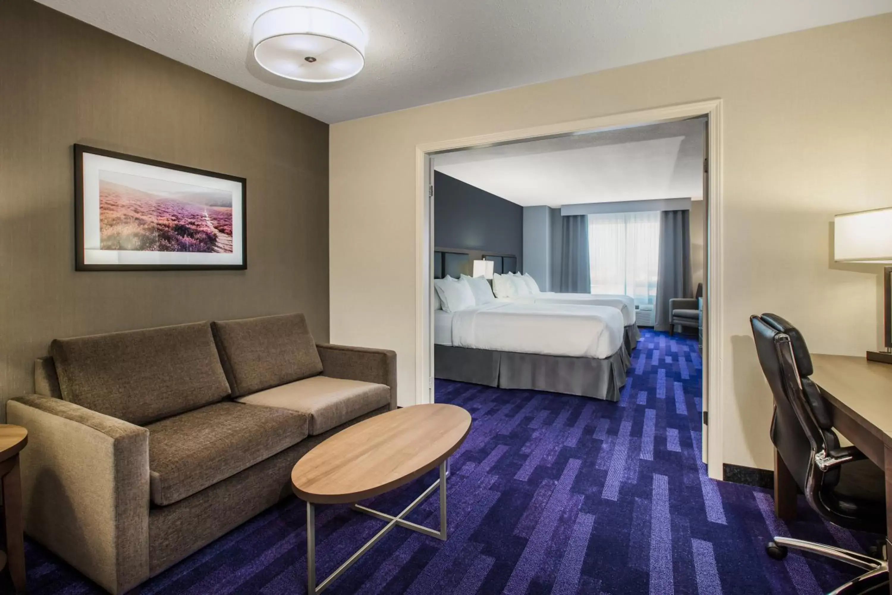 Living room, Seating Area in Holiday Inn & Suites Grande Prairie, an IHG Hotel