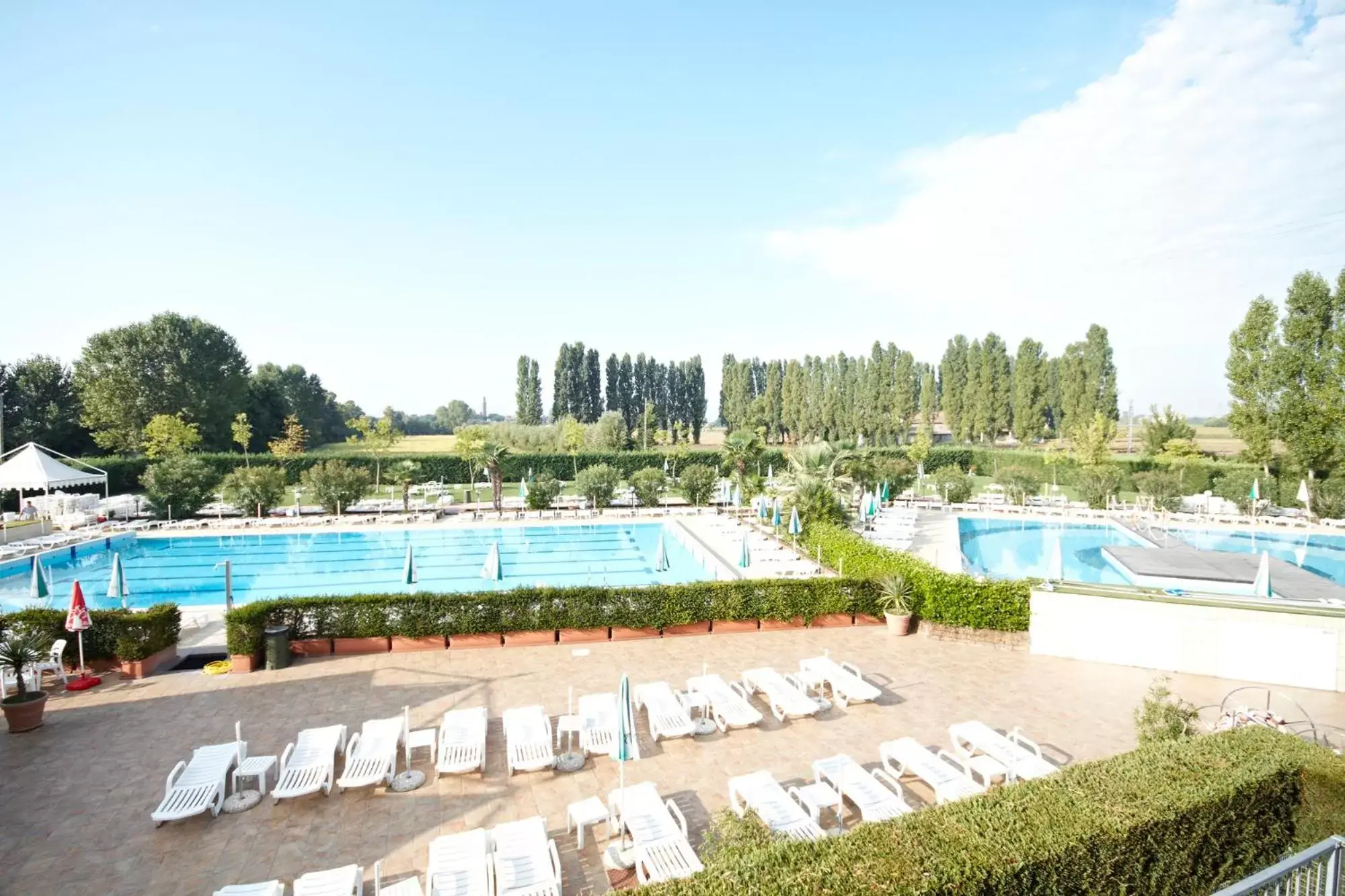 Patio, Pool View in GREEN GARDEN Resort - Smart Hotel