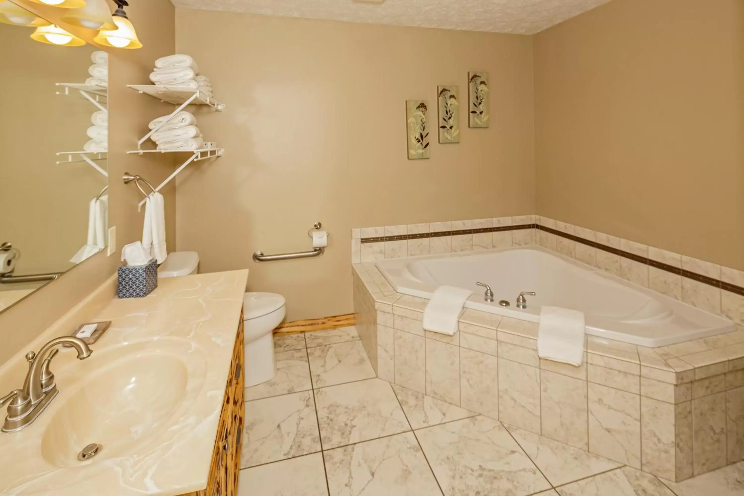 Bathroom in Sojourner's Lodge & Log Cabin Suites