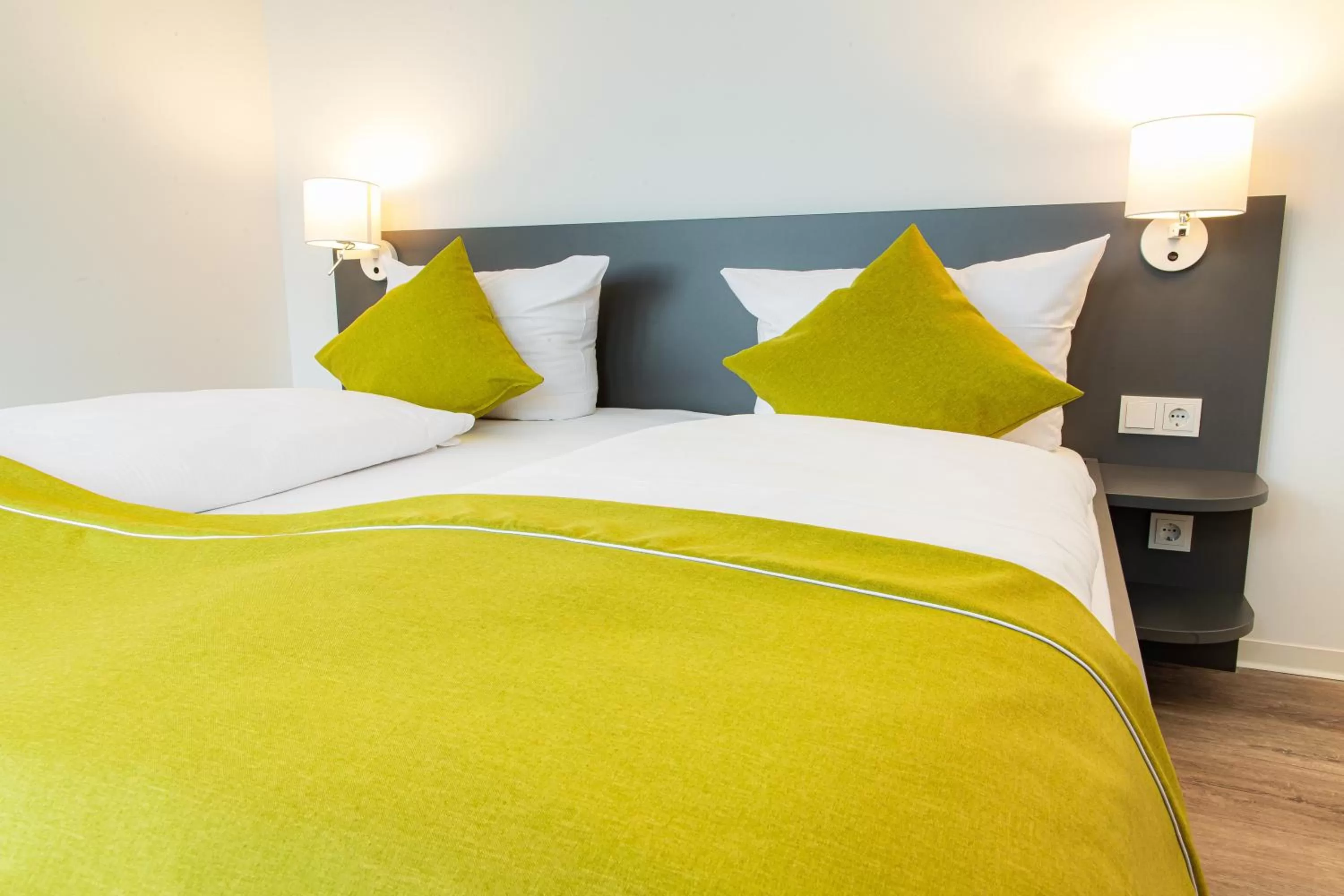 Bed in Das ELB Boardinghouse Hotel Restaurant