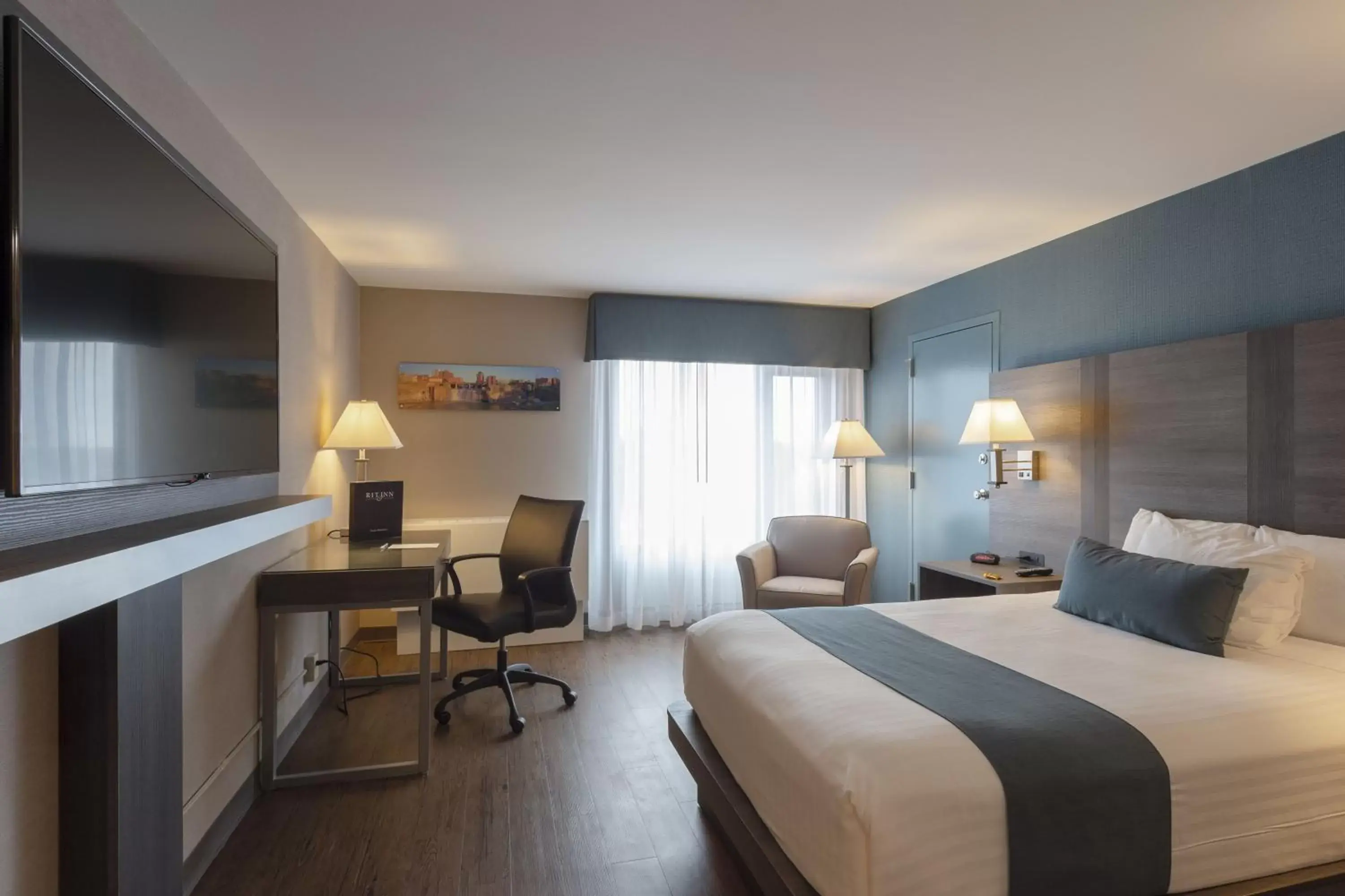 Bed in RIT Inn & Conference Center Bed in RIT Inn & Conference Center