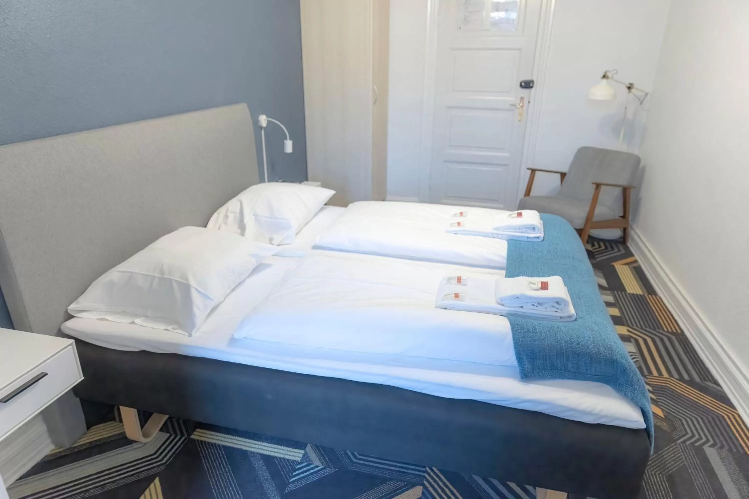 Bed in Hotel Harmonien